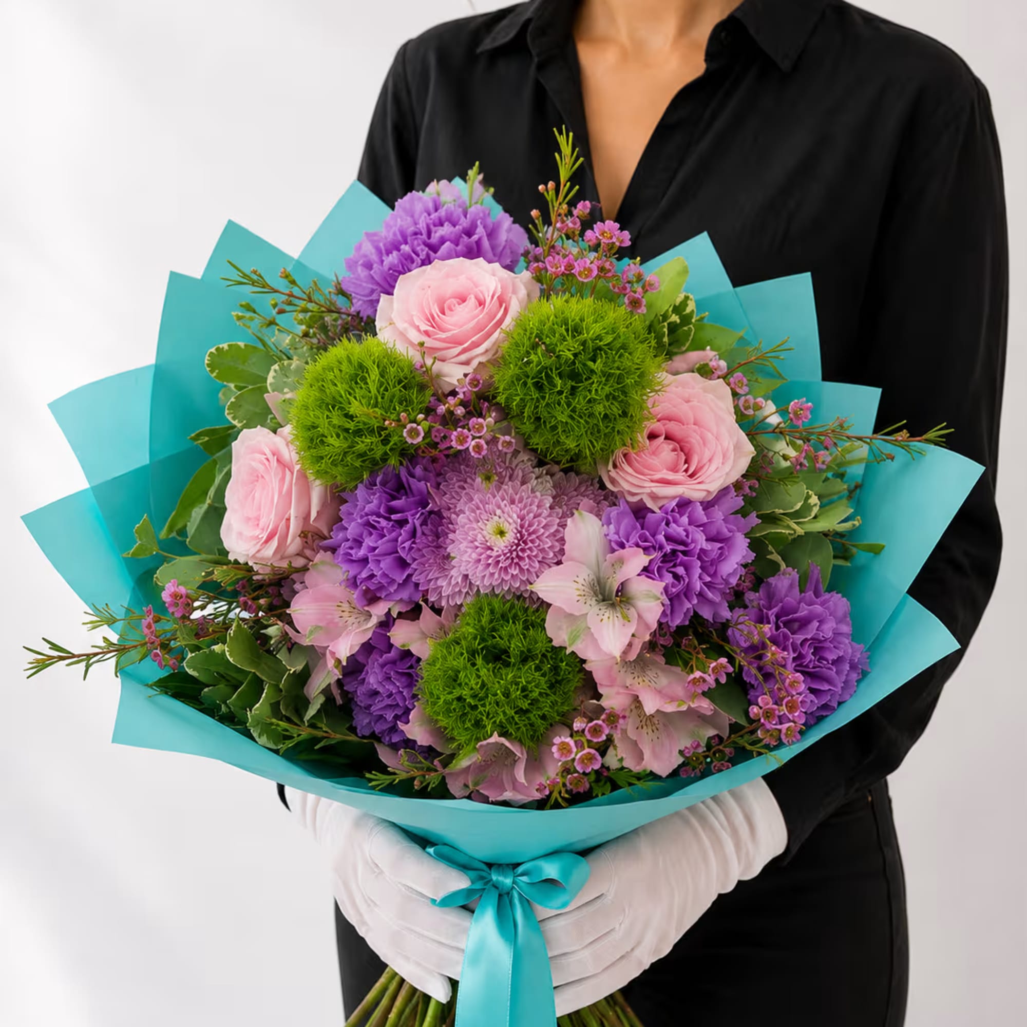 Celeste exclusively designed and sold by Velvet Stems&trade; is a graceful hand-tied