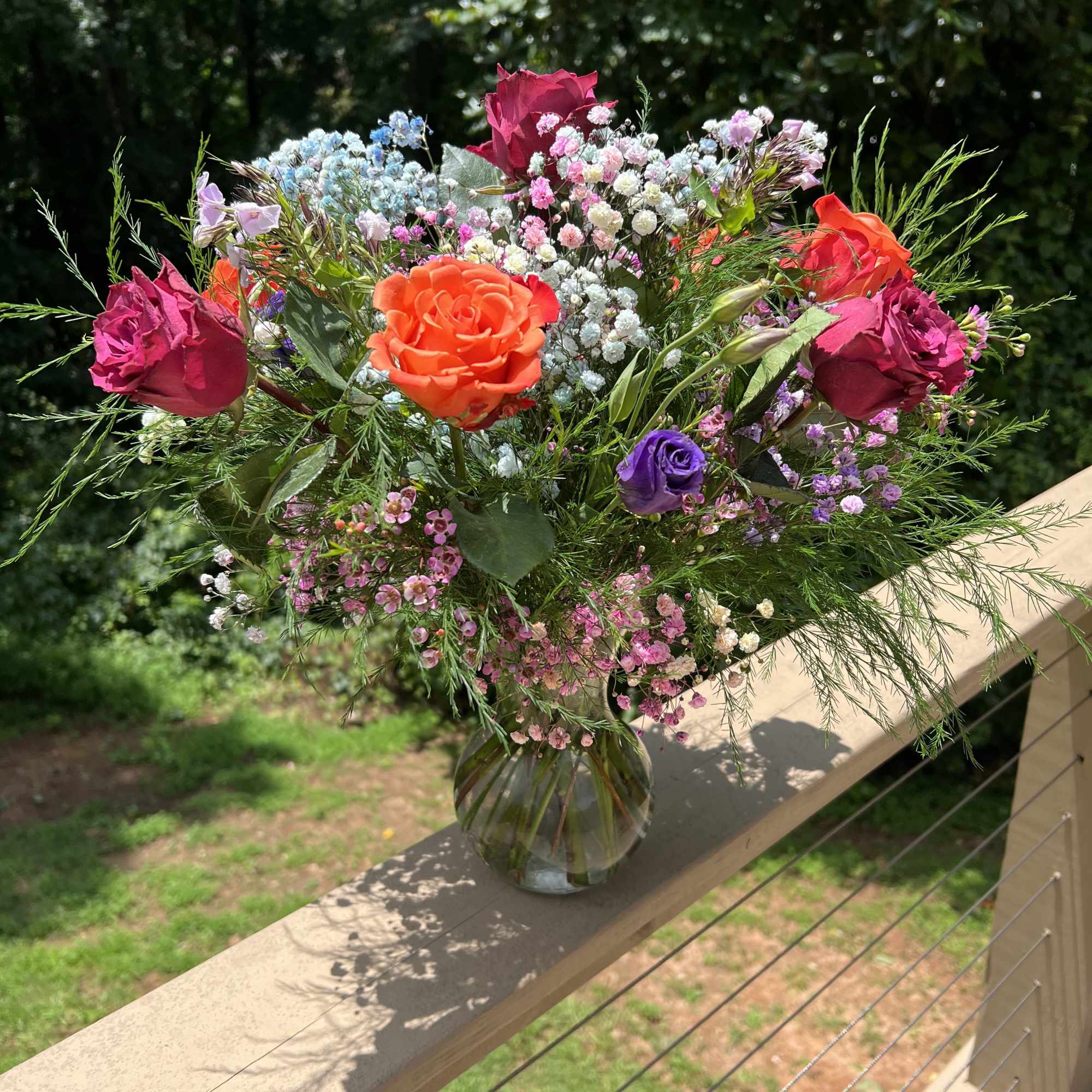 Vibrant arrangement with a color palette of orange yellow green blue. Full