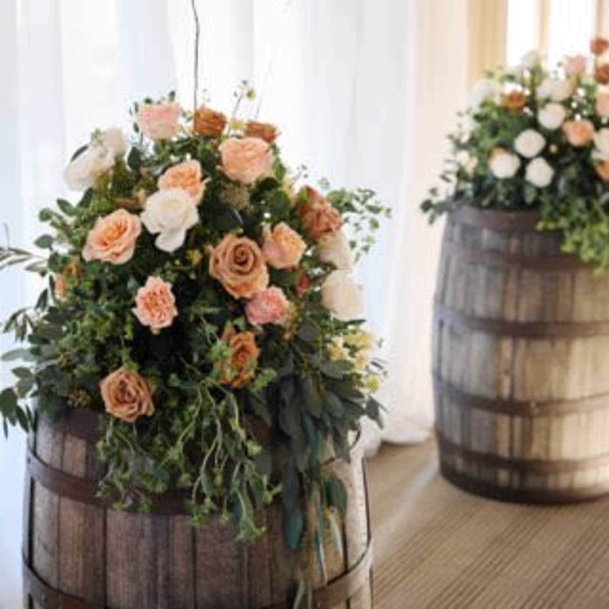 large floral toppers can be in front of arbors, on top of