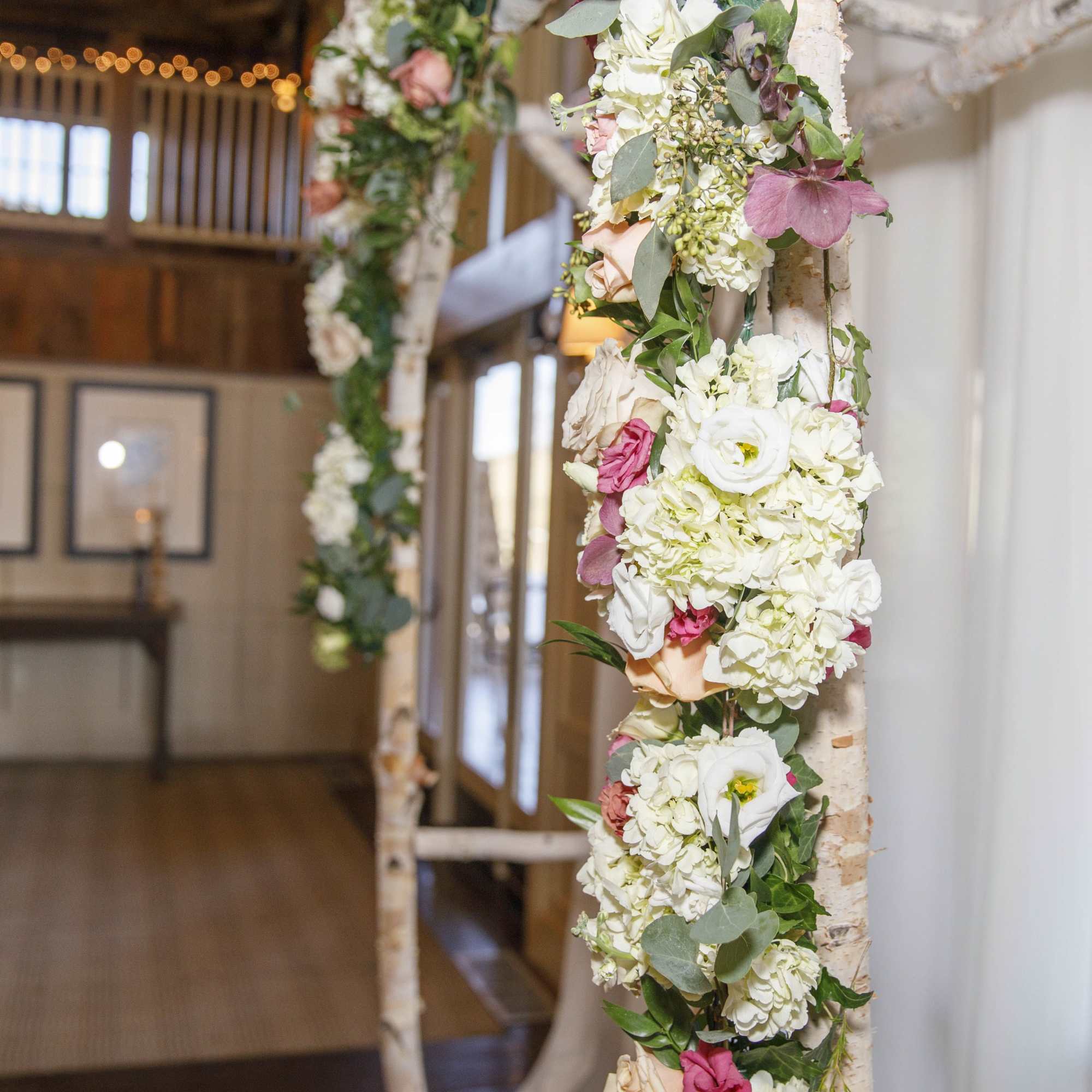 florals and greens woven around said structure