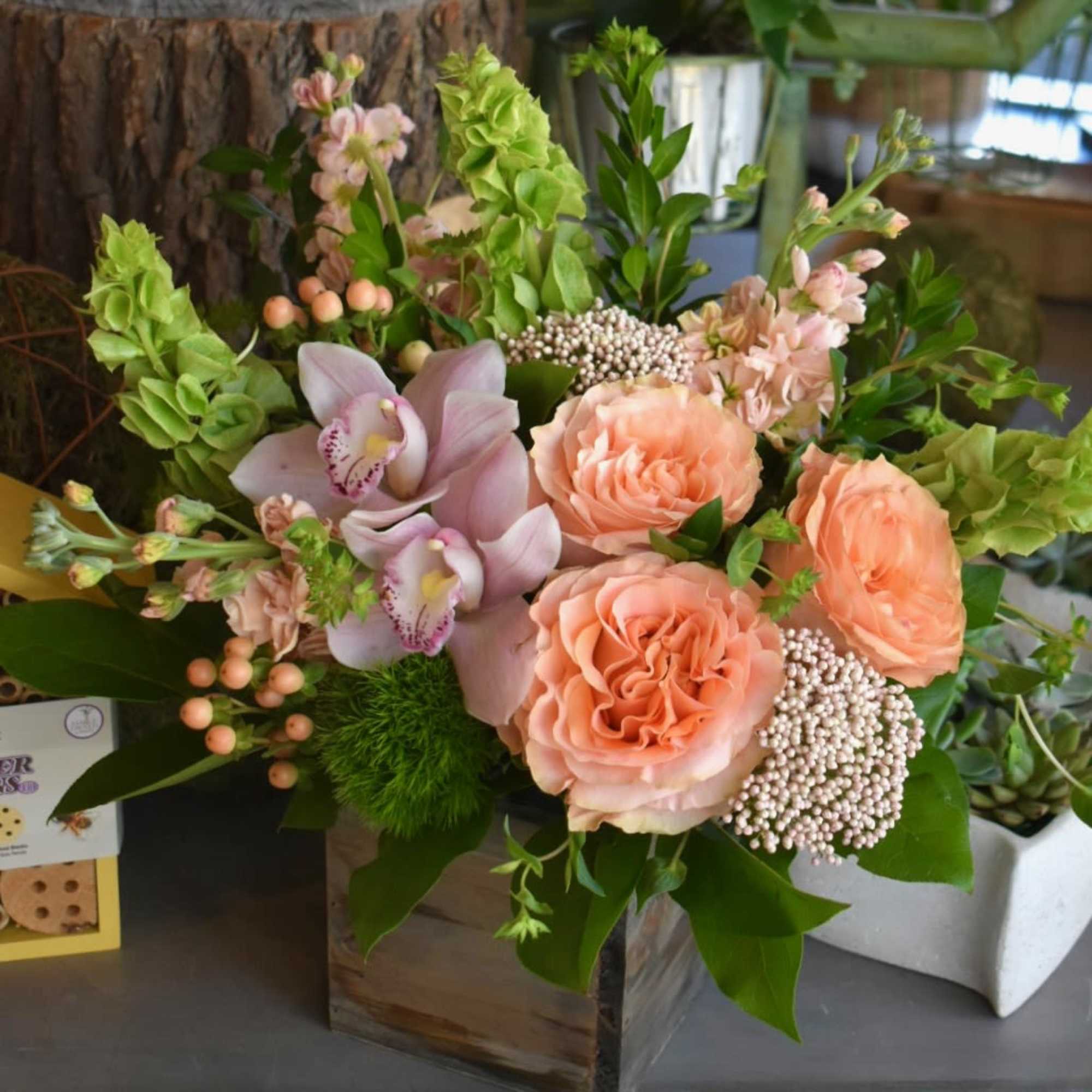 Blush Riviera contains a landscape of princess crown roses, peach stock, pink