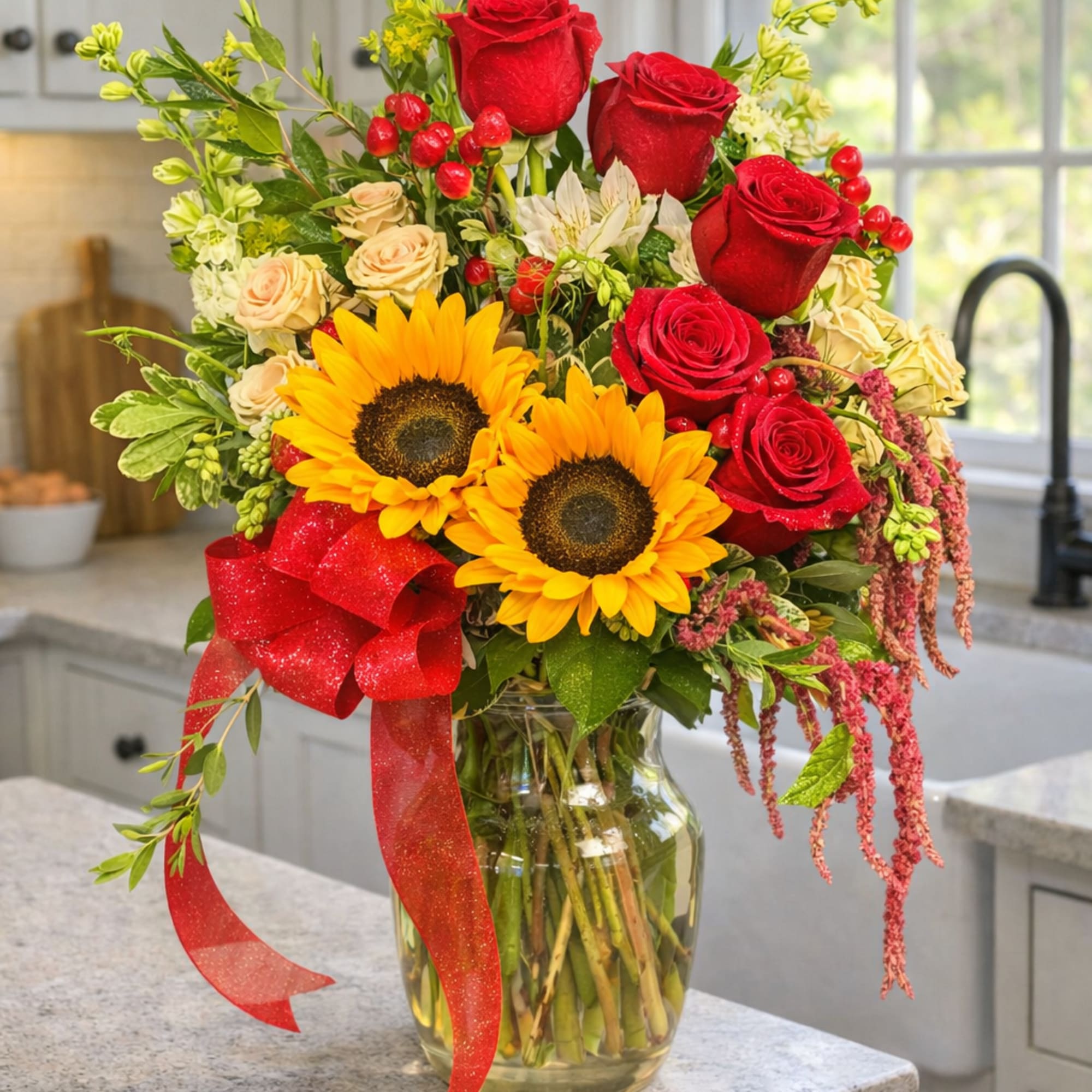 A cheerful, abundant bouquet that puts a sunny sunflower center stage -