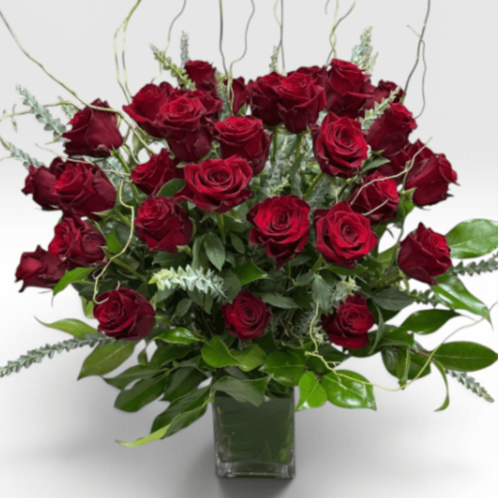 Our take on a classic arrangement of beautiful premium Red Roses. Our