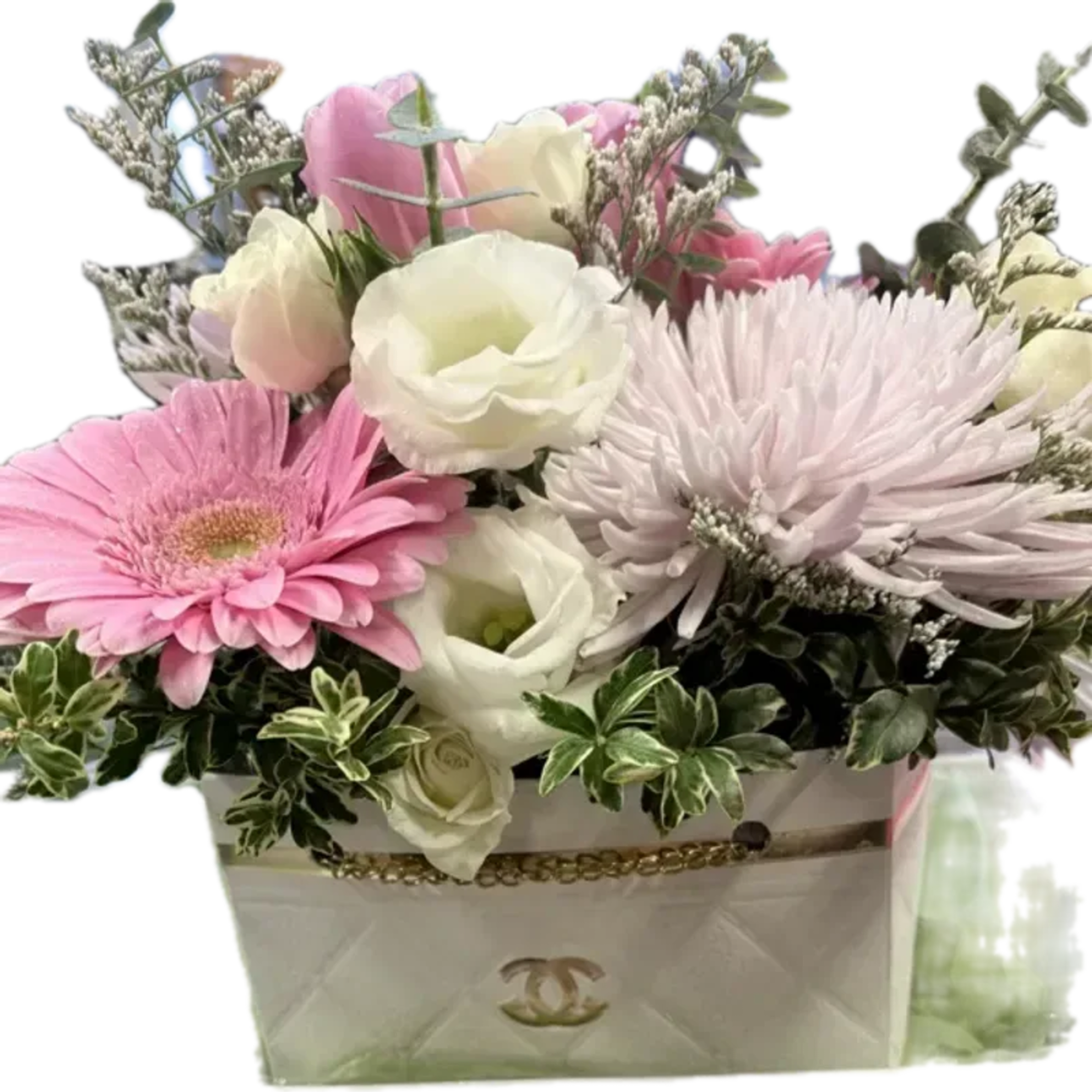 A compact, gift-ready arrangement of soft pinks, creamy whites and pale lavender