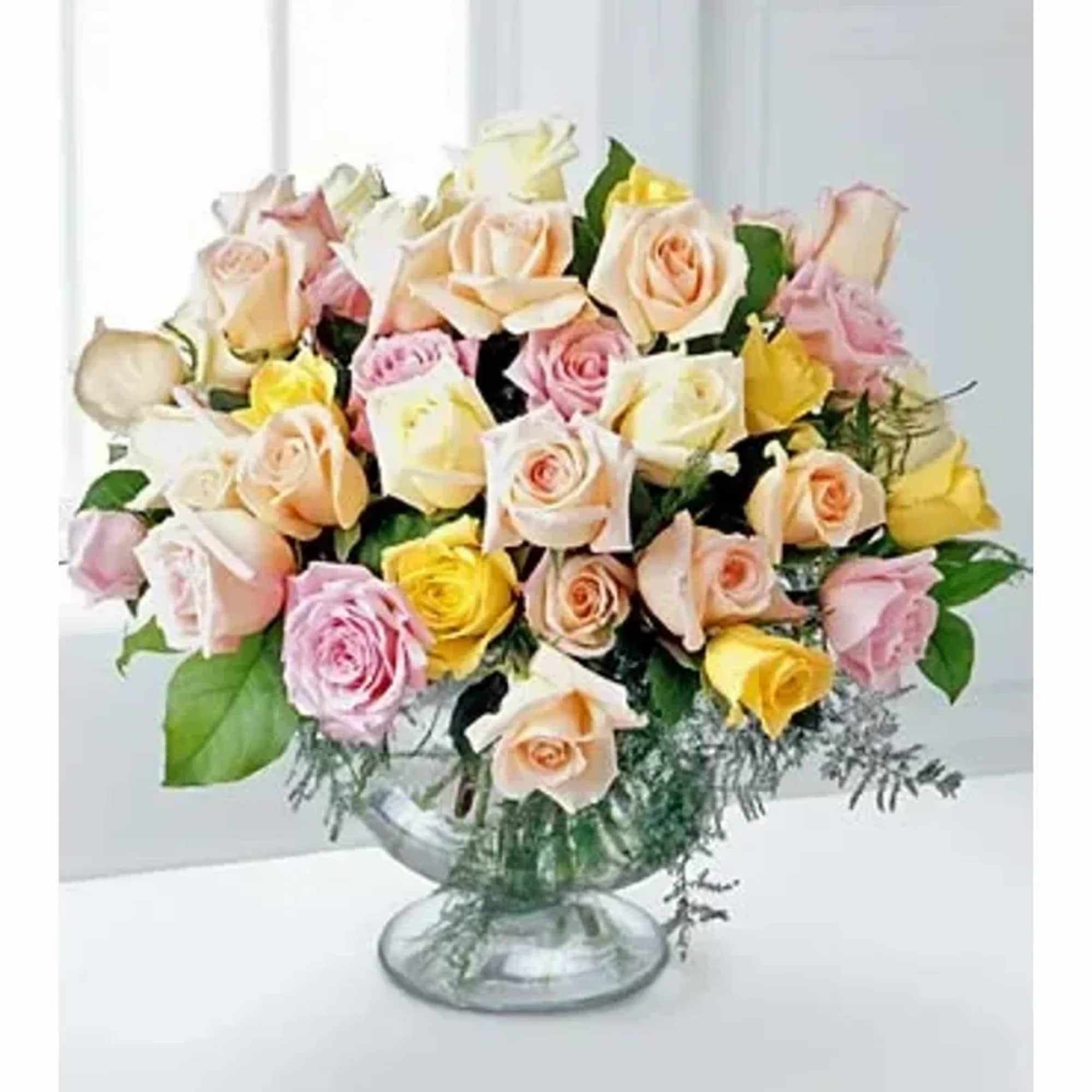 Send expressions of comfort with this refined bouquet of mixed color roses.