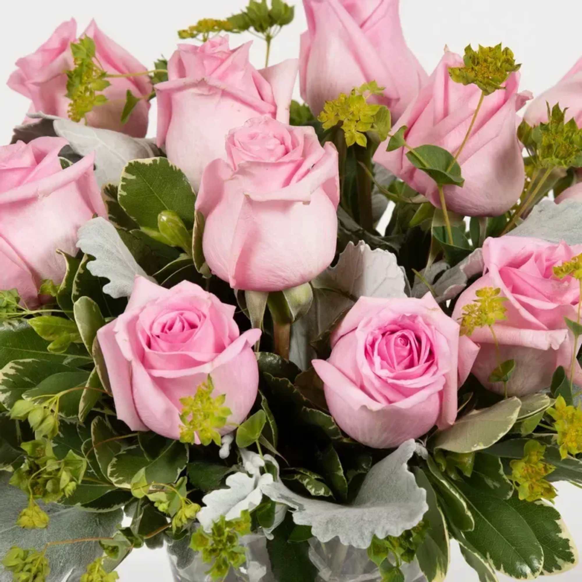 Send your sweetheart a sweet arrangement of a dozen pink roses, signifying