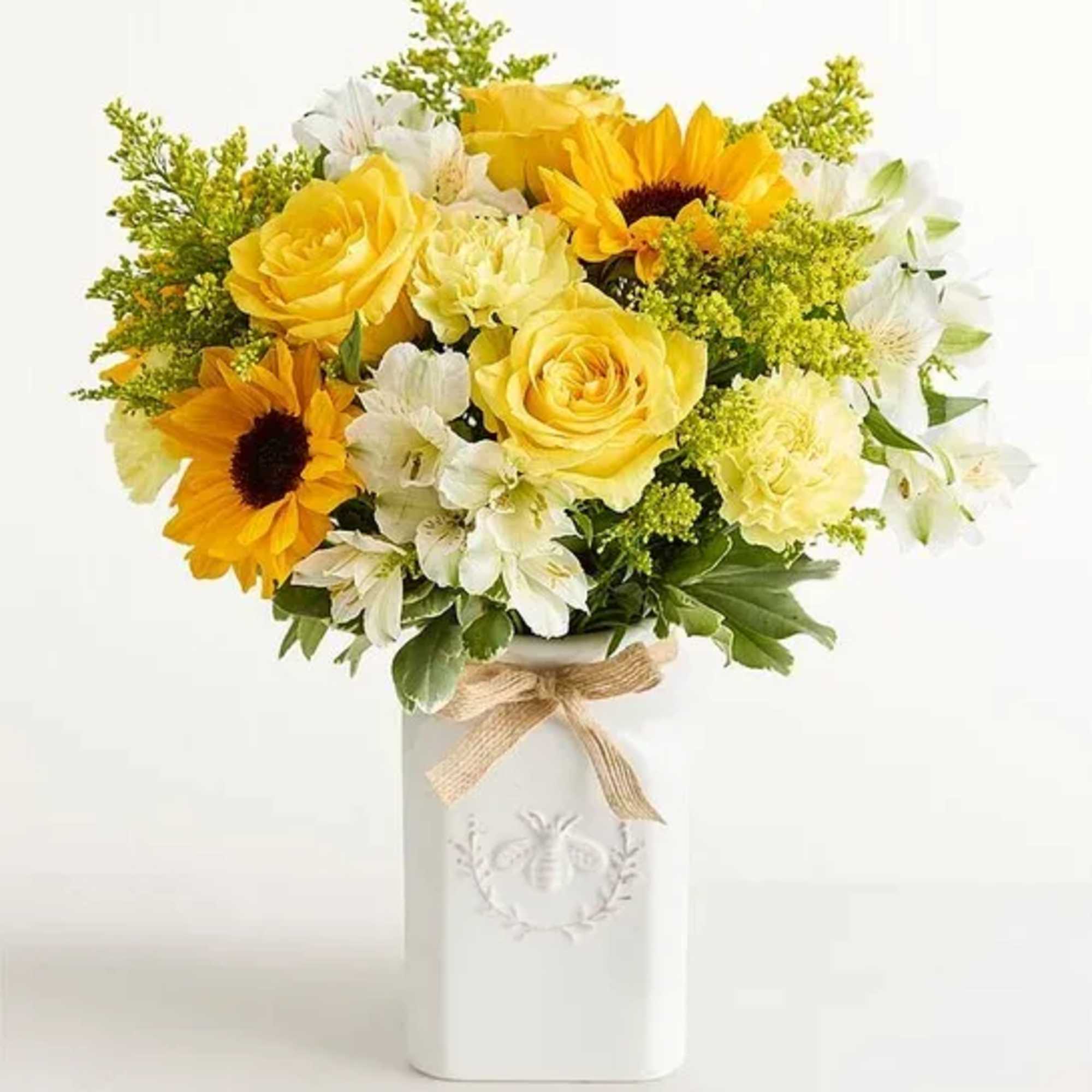 This sunny bouquet is certain to create quite the buzz! Roses, sunflowers