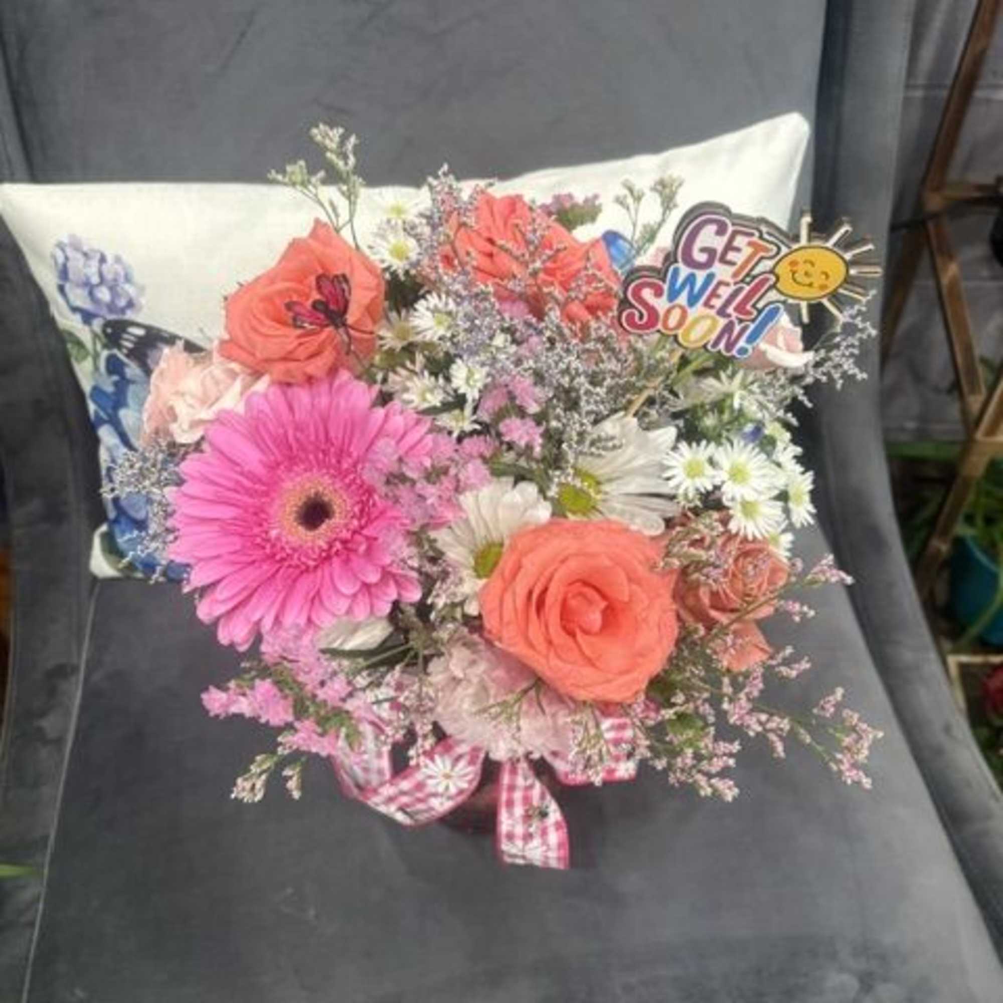 Fresh-picked charm in every petal. This organic arrangement beautifully balances wild pink