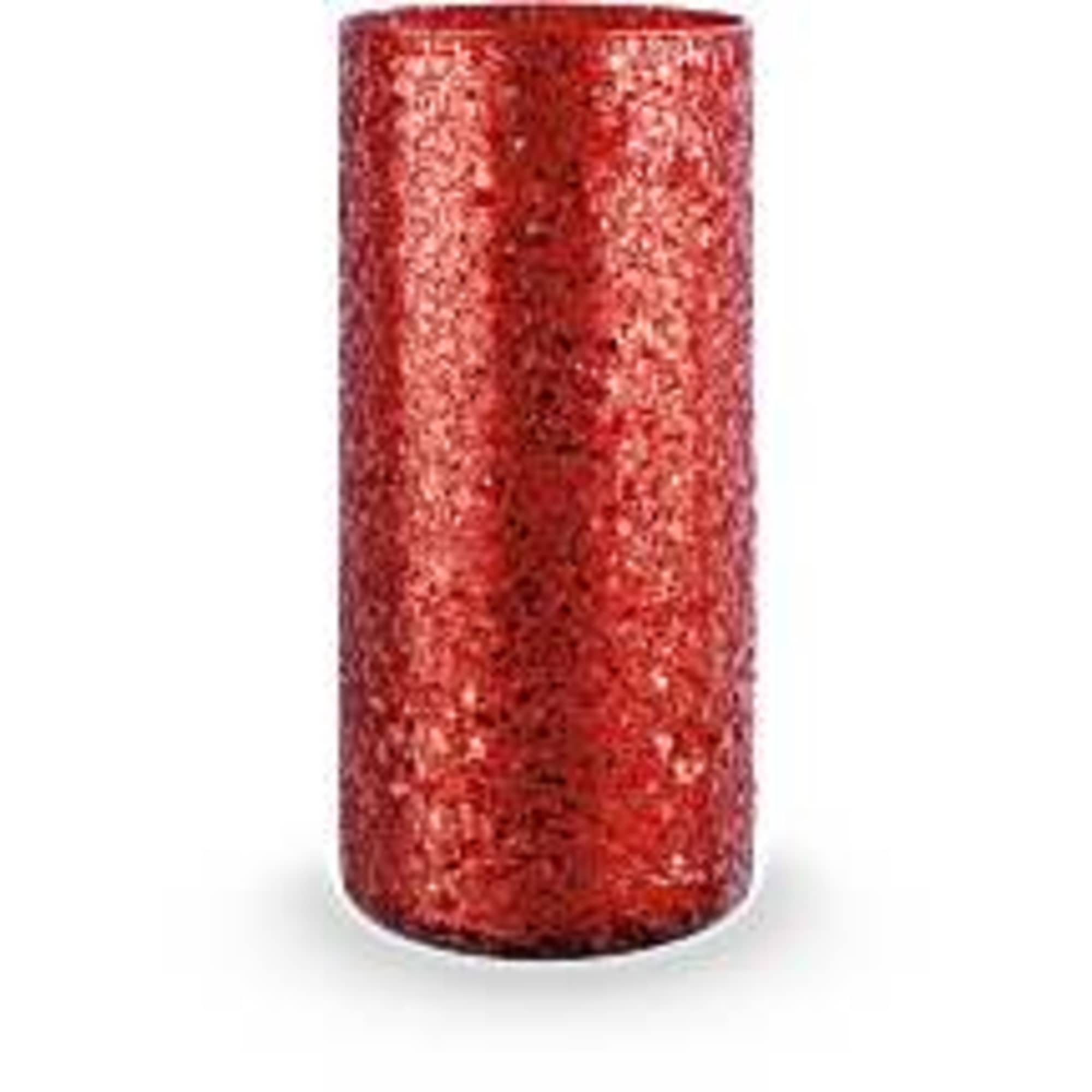 Red glittery cylindrical candle holder on a white background