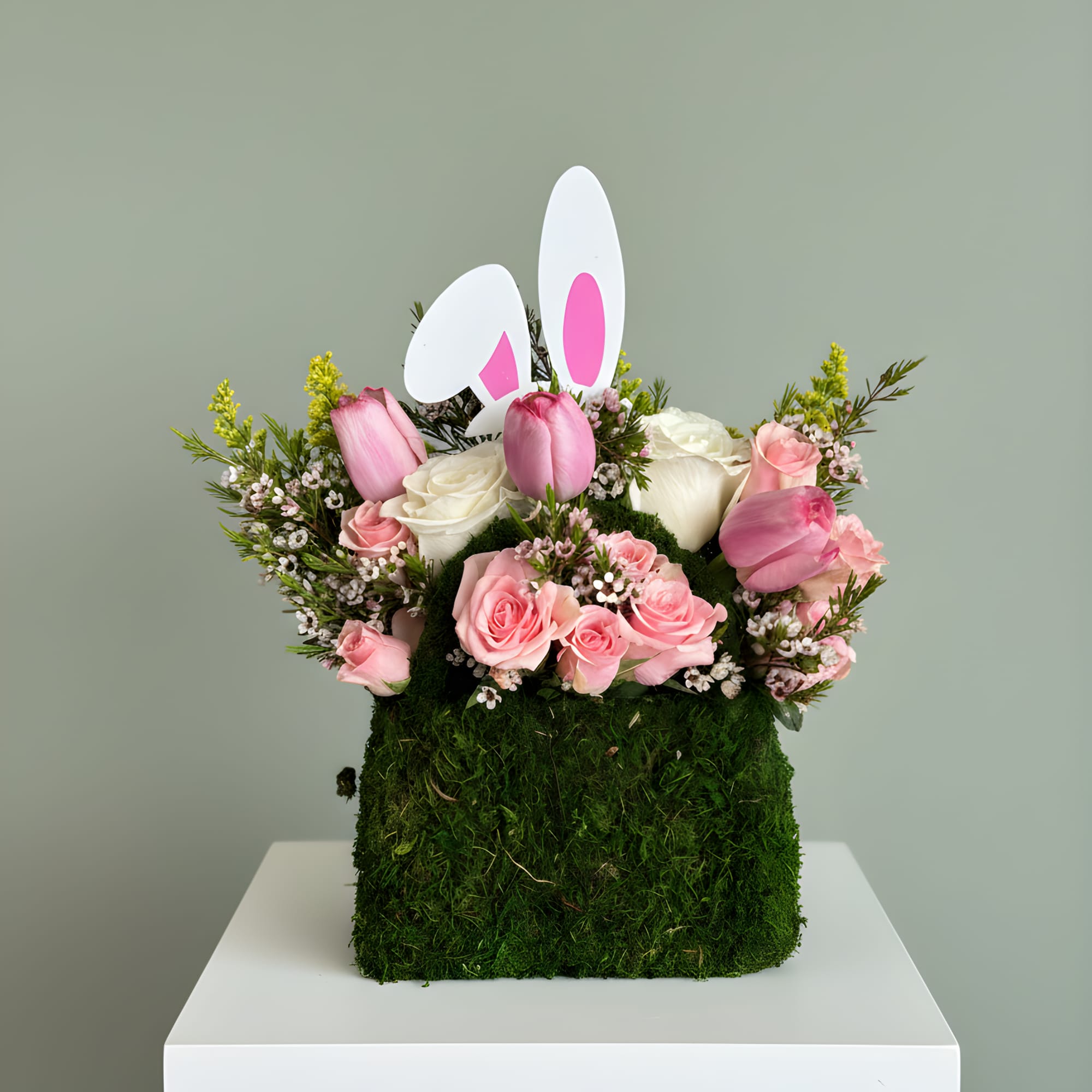 Celebrate the beauty of spring with this charming and elegant bunny-inspired floral