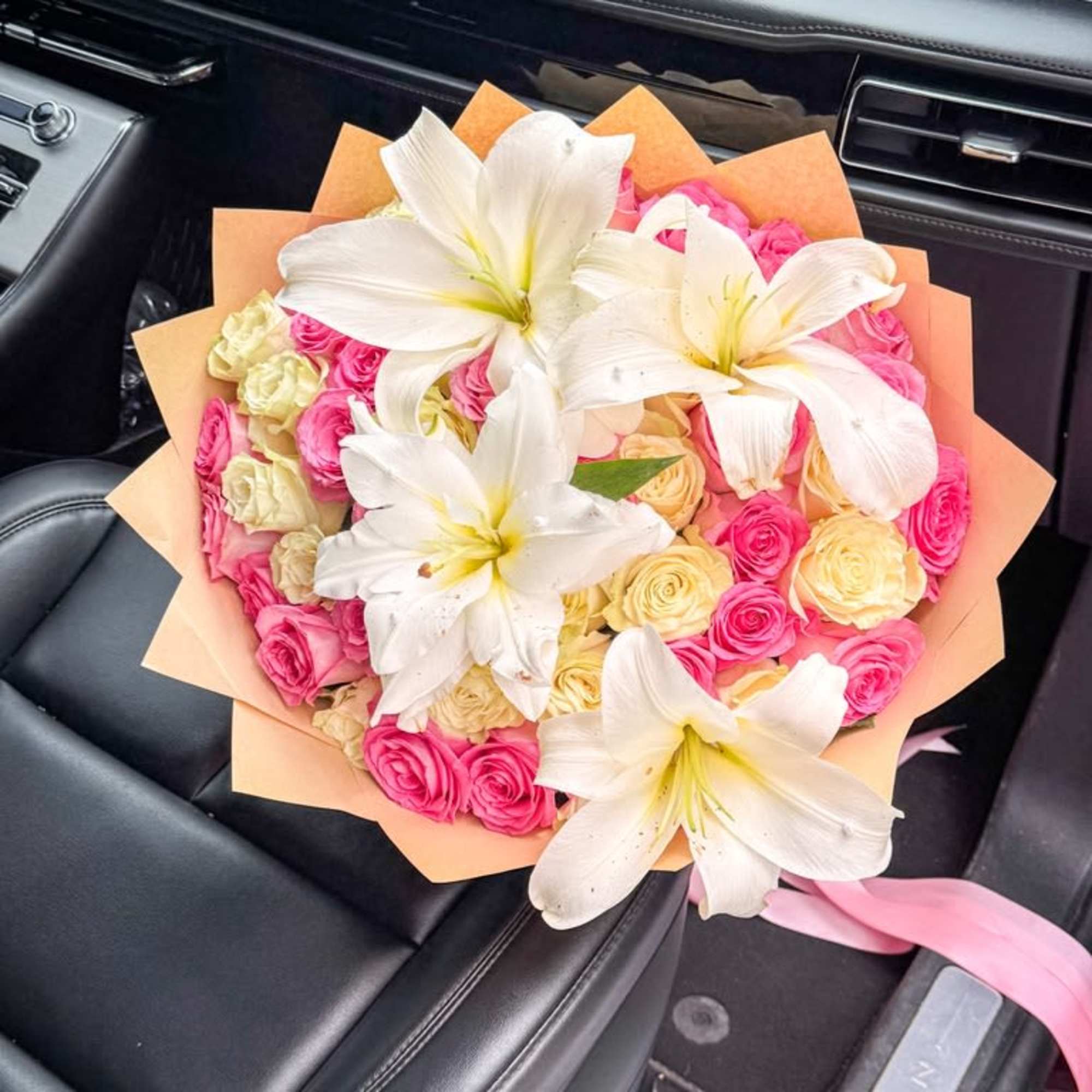 Bold, elegant, and unforgettable. The Royal Lily Garden Bouquet combines fragrant white