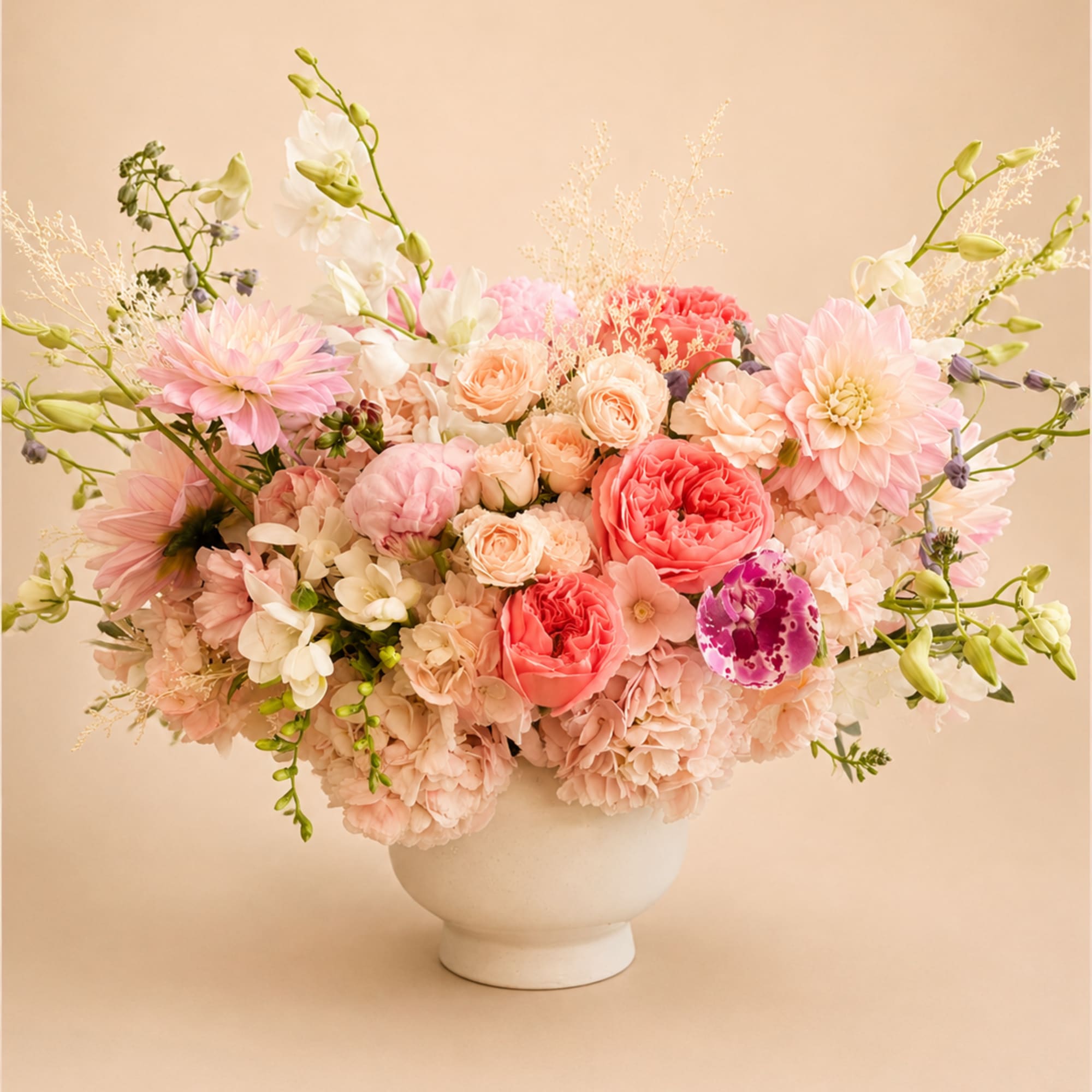 Flowers: pink x-pression garden roses, light pink peonies, blush majolica spray roses