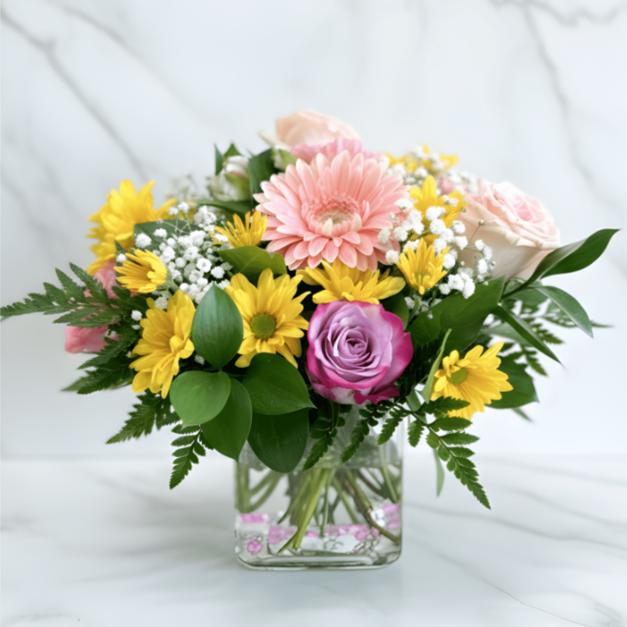 Bring warmth and happiness to any occasion with Floral Melody, a vibrant