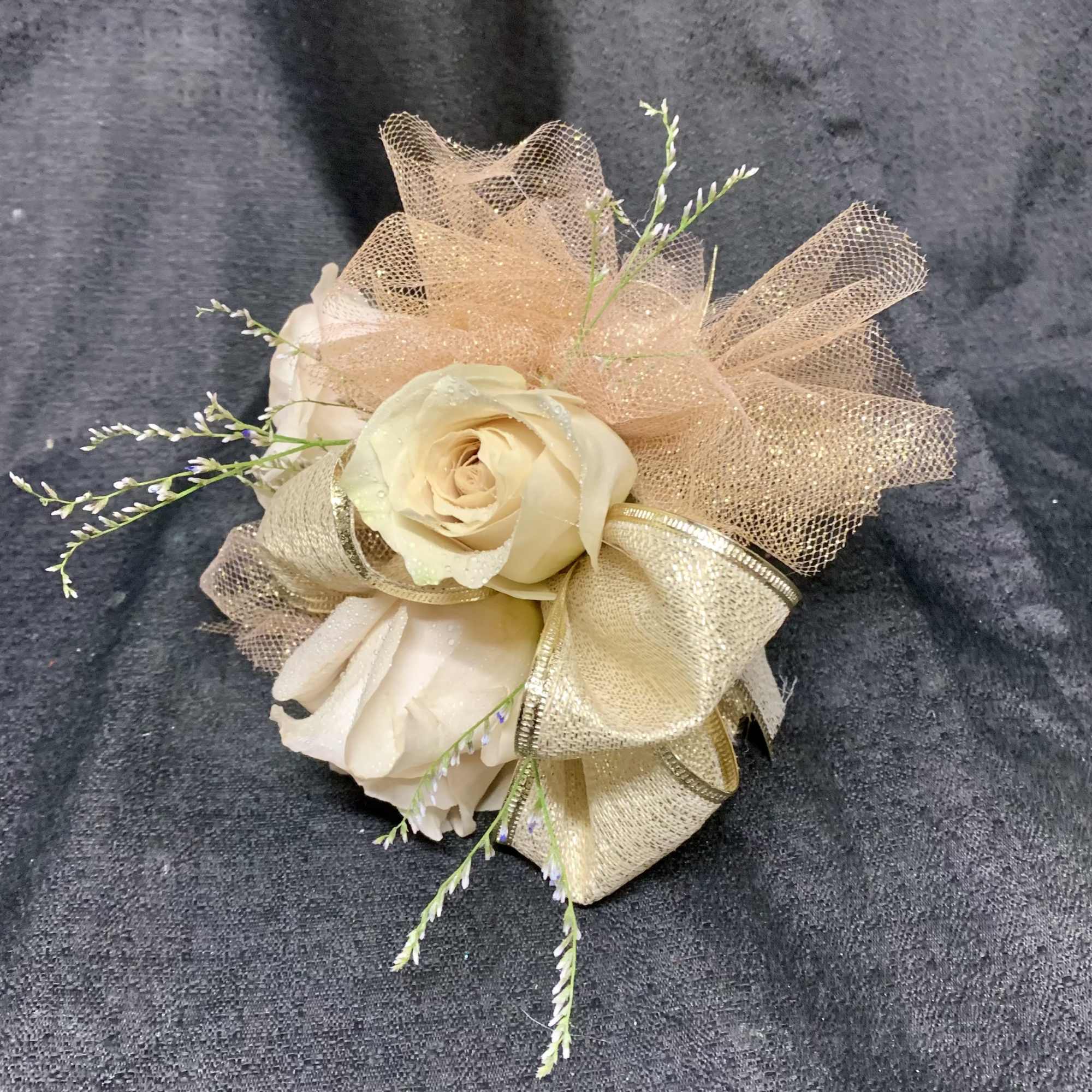Cream rose corsage with gold ribbon and mesh accents
