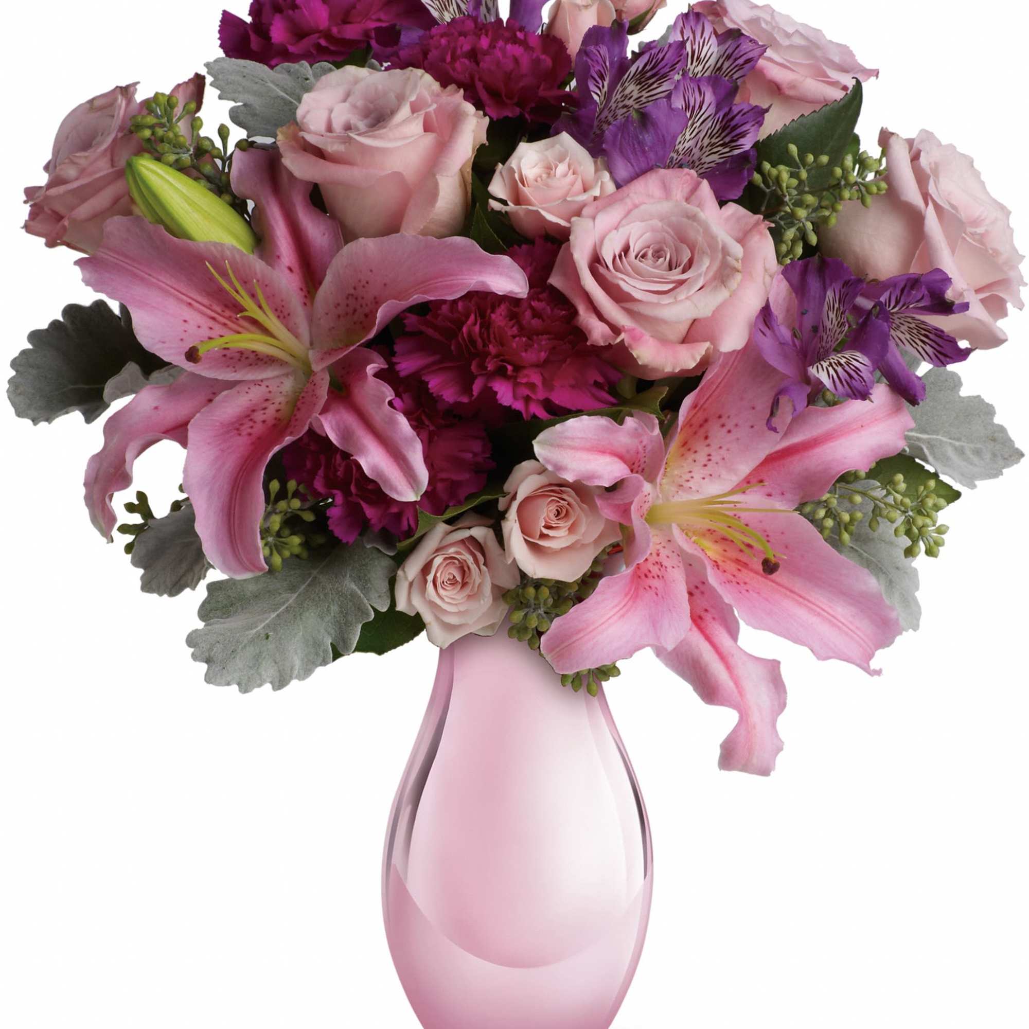 Pink and purple bouquet in a pink glass vase