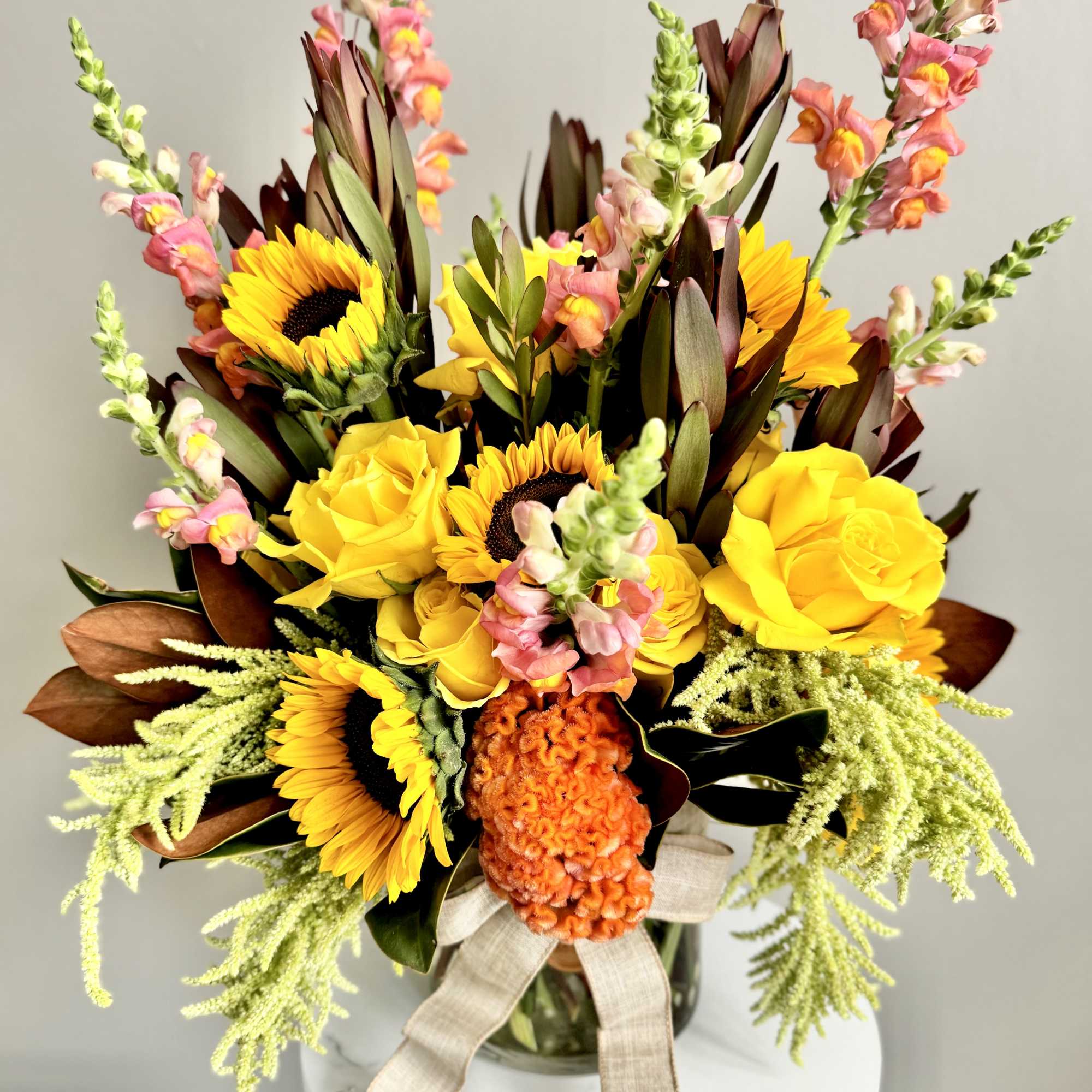 Say hello to the new season with this tower of fall flowers!