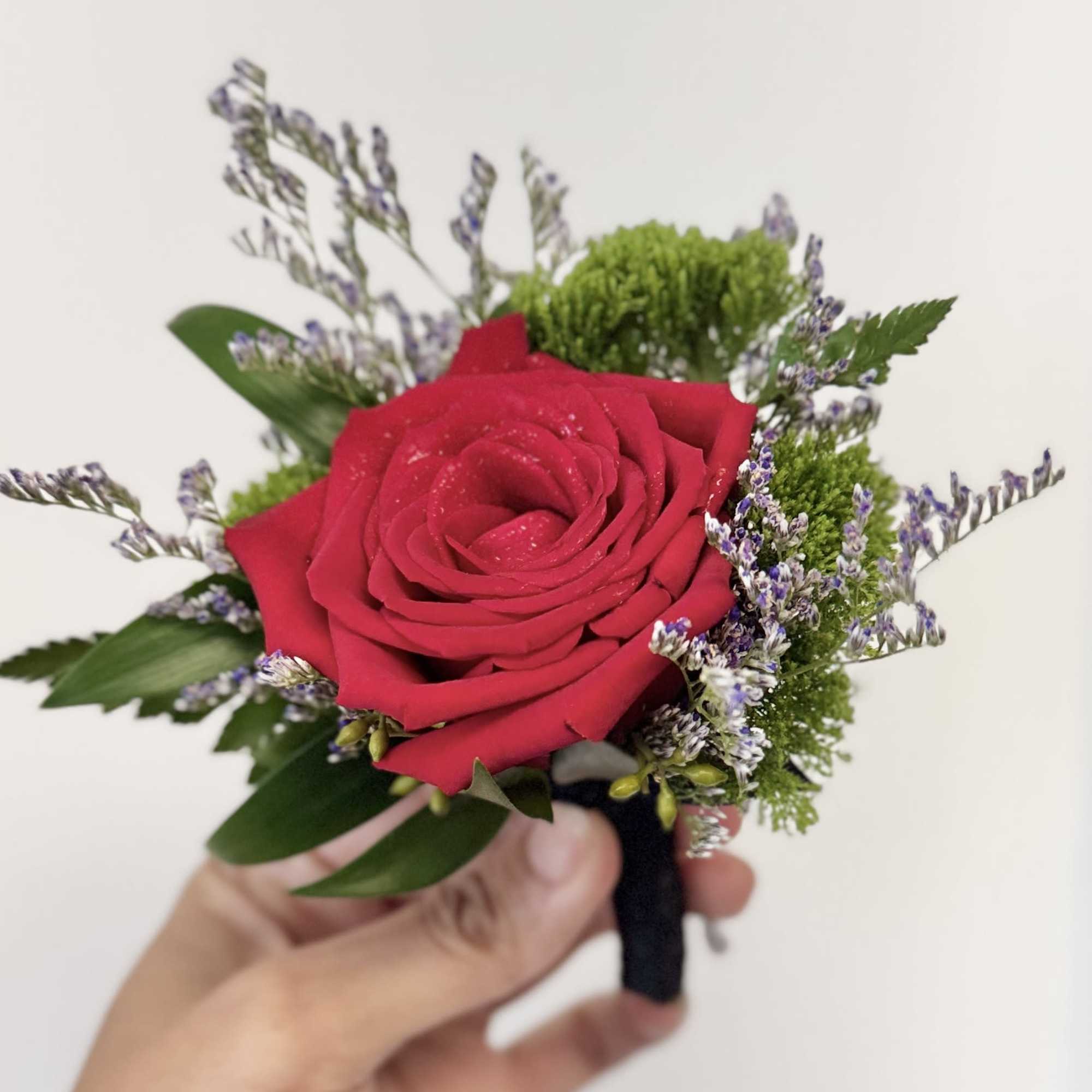 A youthful and elegant design especially created by the Florist. Flowers are