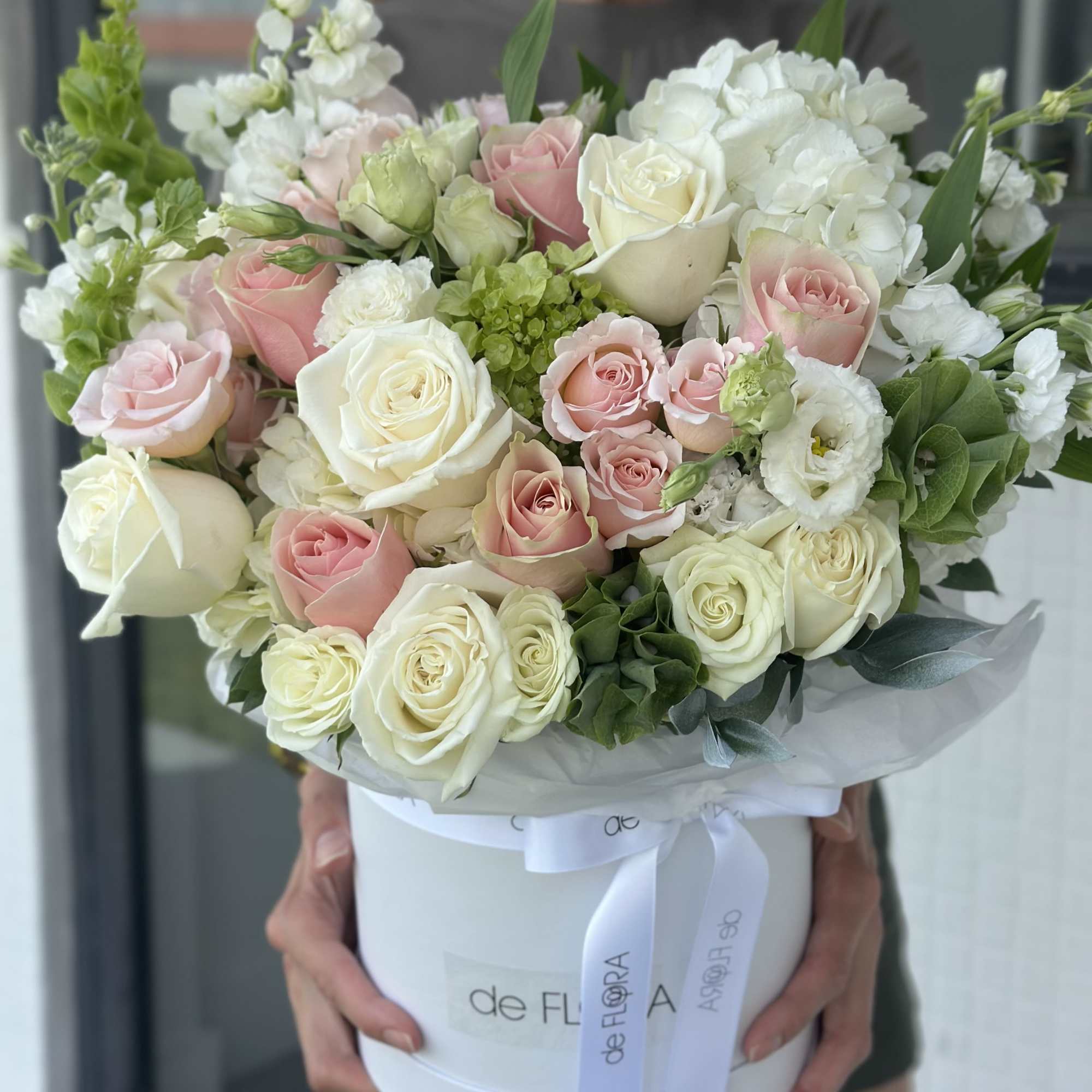 Bouquet of pink and white roses in a white hat box, photo 2 of 2