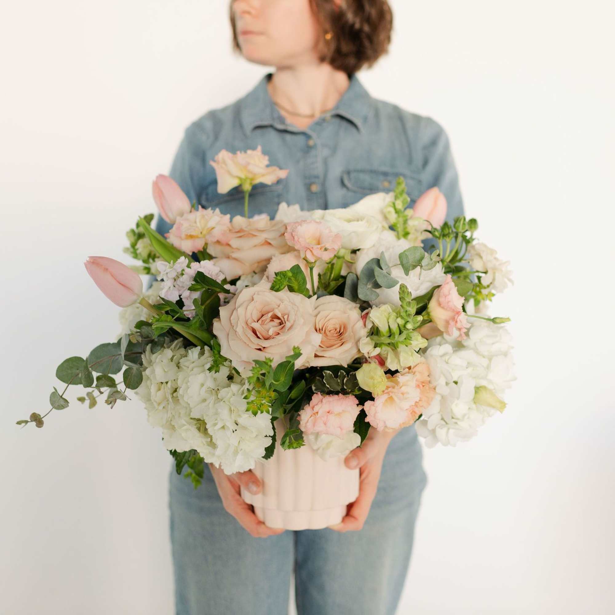 The sweetest, prettiest arrangement for the loveliest person you know. Featuring blush