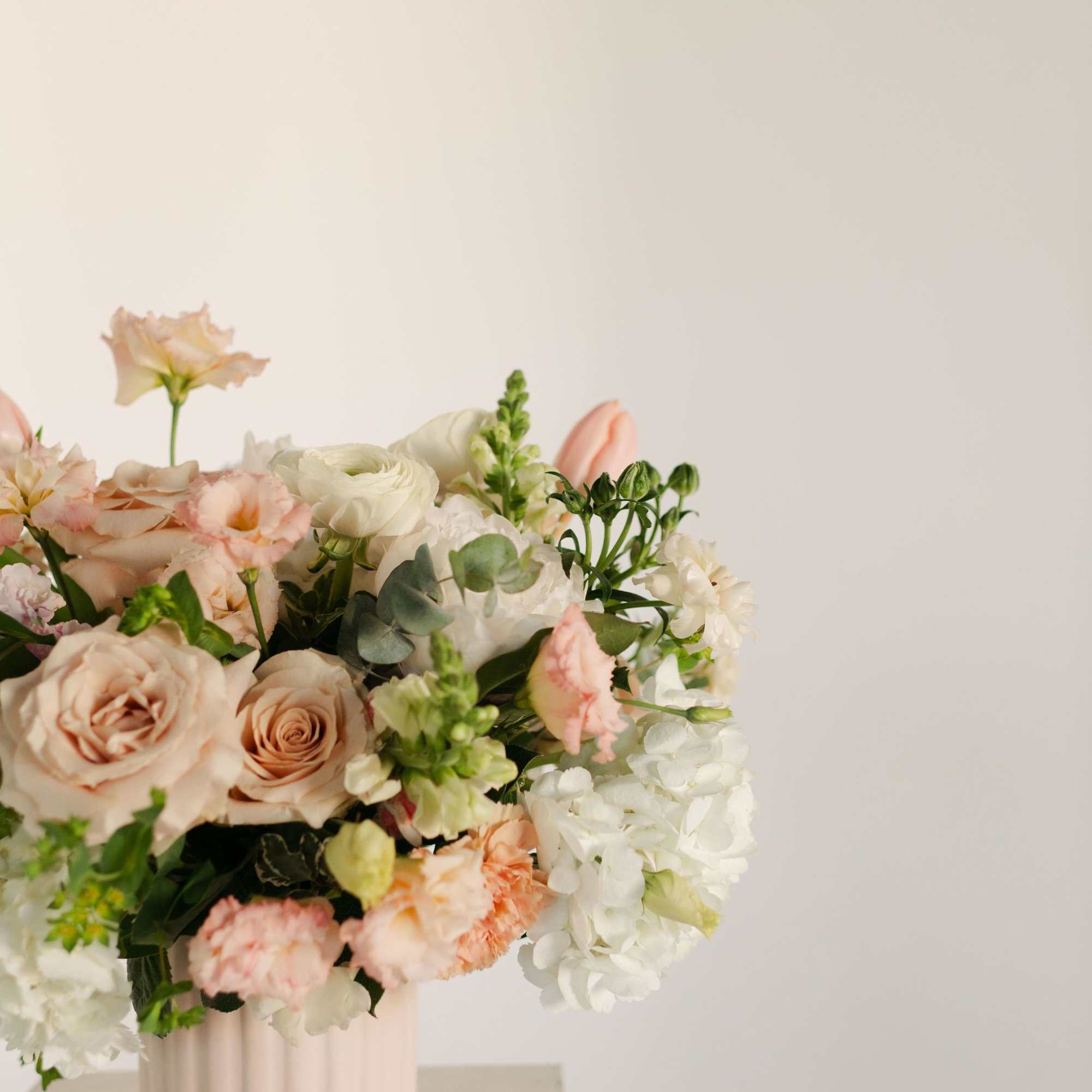 The sweetest, prettiest arrangement for the loveliest person you know. Featuring blush