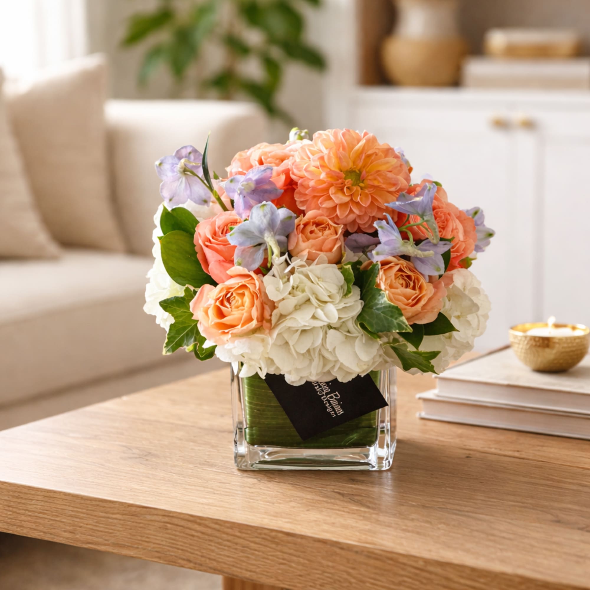 Sweet, graceful, and effortlessly elegant, Dottie is a garden-inspired flower arrangement designed