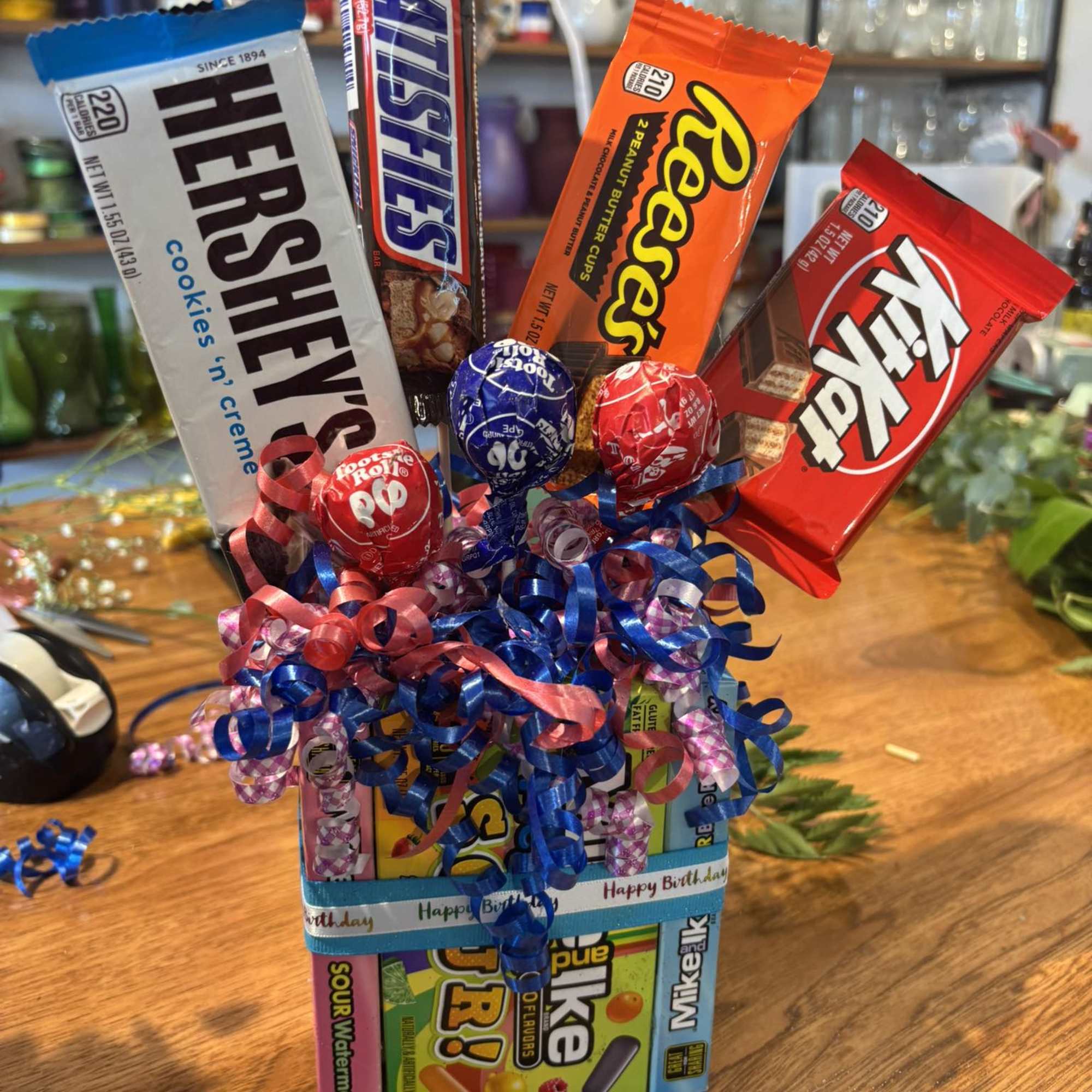 Candy bouquet with Hershey's, Snickers, Reese's, and Kit Kat bars