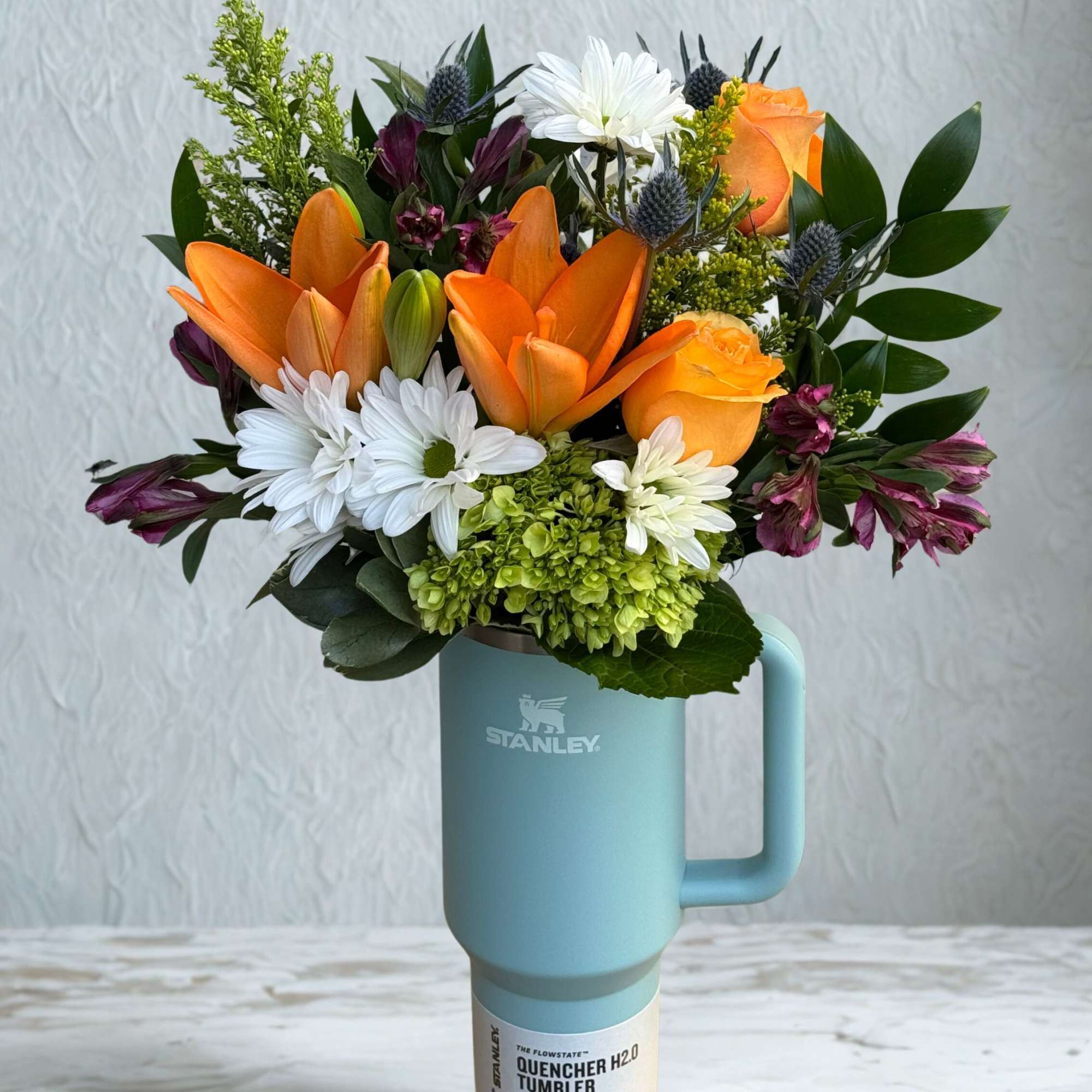 The perfect gift for any Stanley lover. Each arrangement features a seasonal