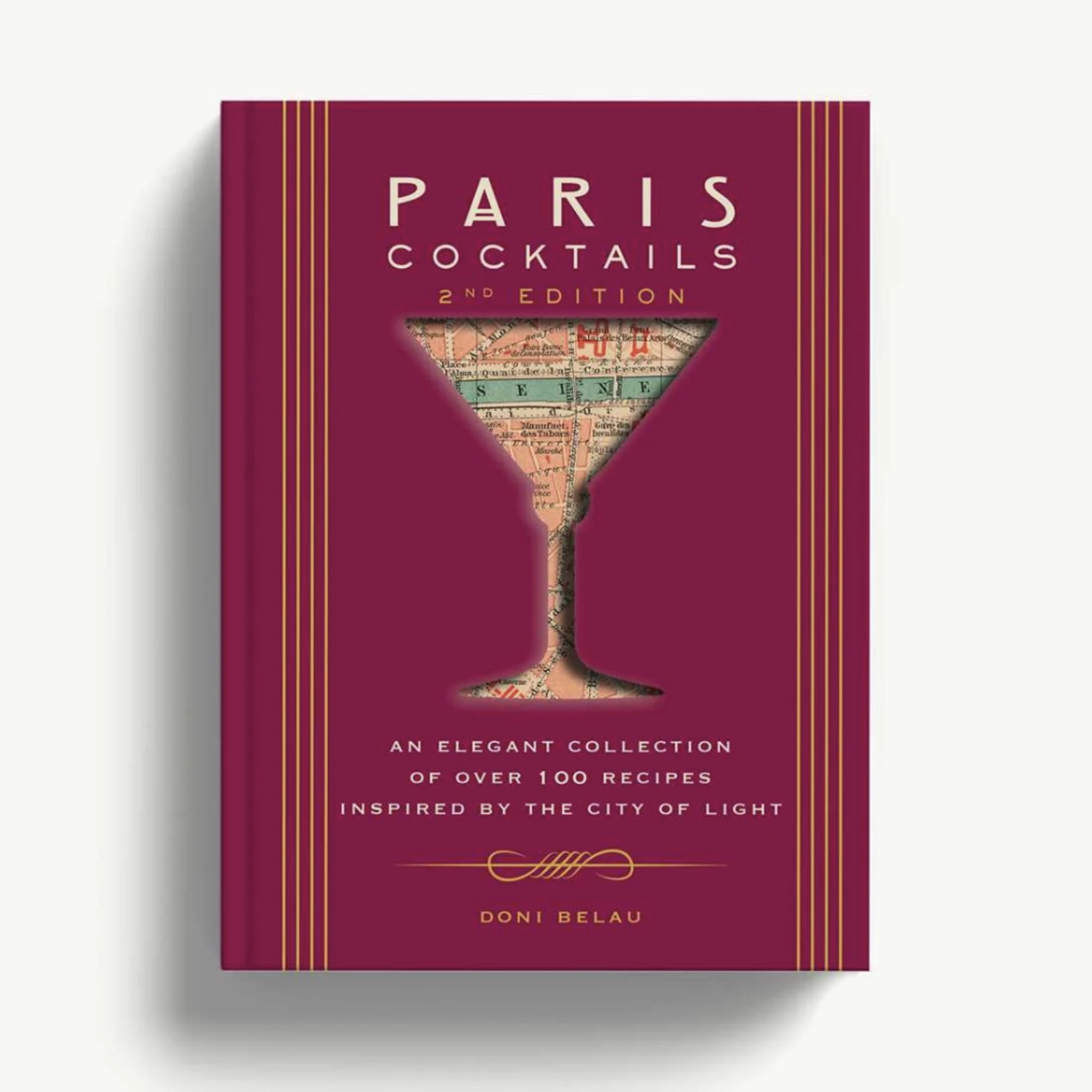 Magenta cocktail recipe book with a martini glass graphic