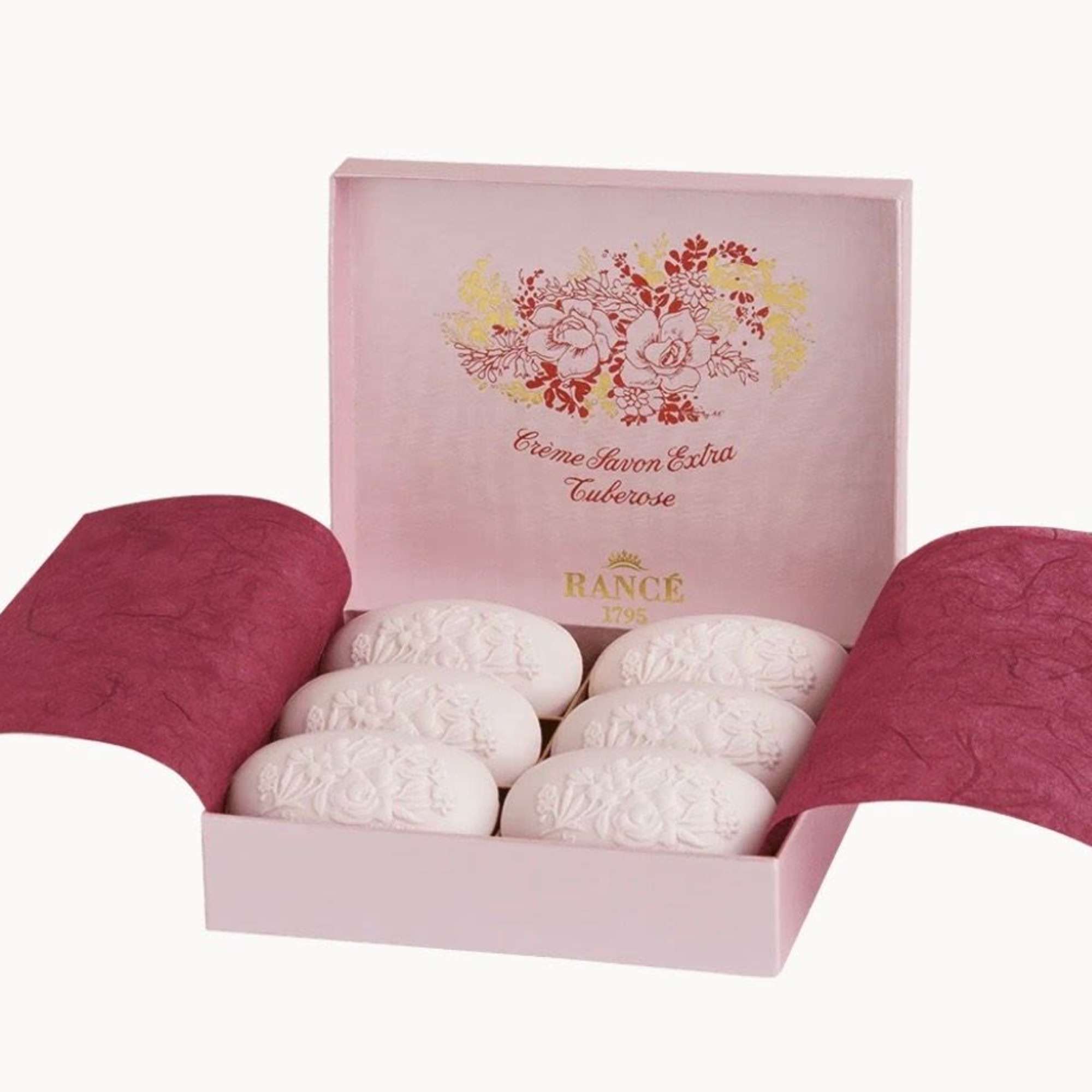 Pink gift box with six white oval soaps