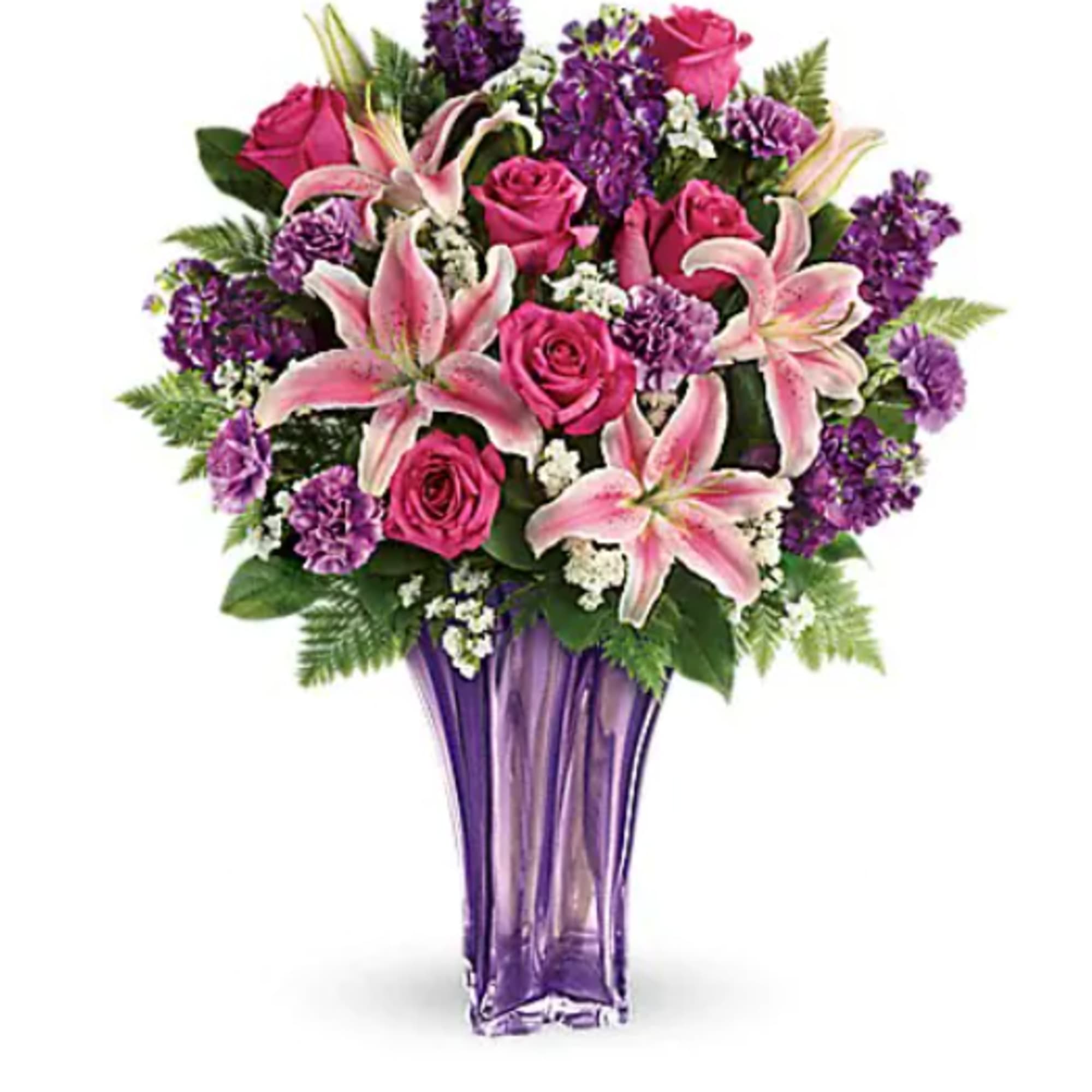 Pink roses and lilies in a purple glass vase
