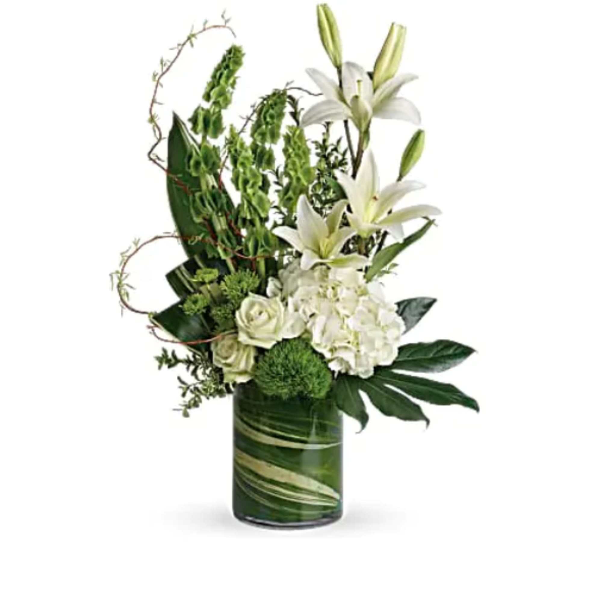 White lilies and roses arranged in a green glass vase