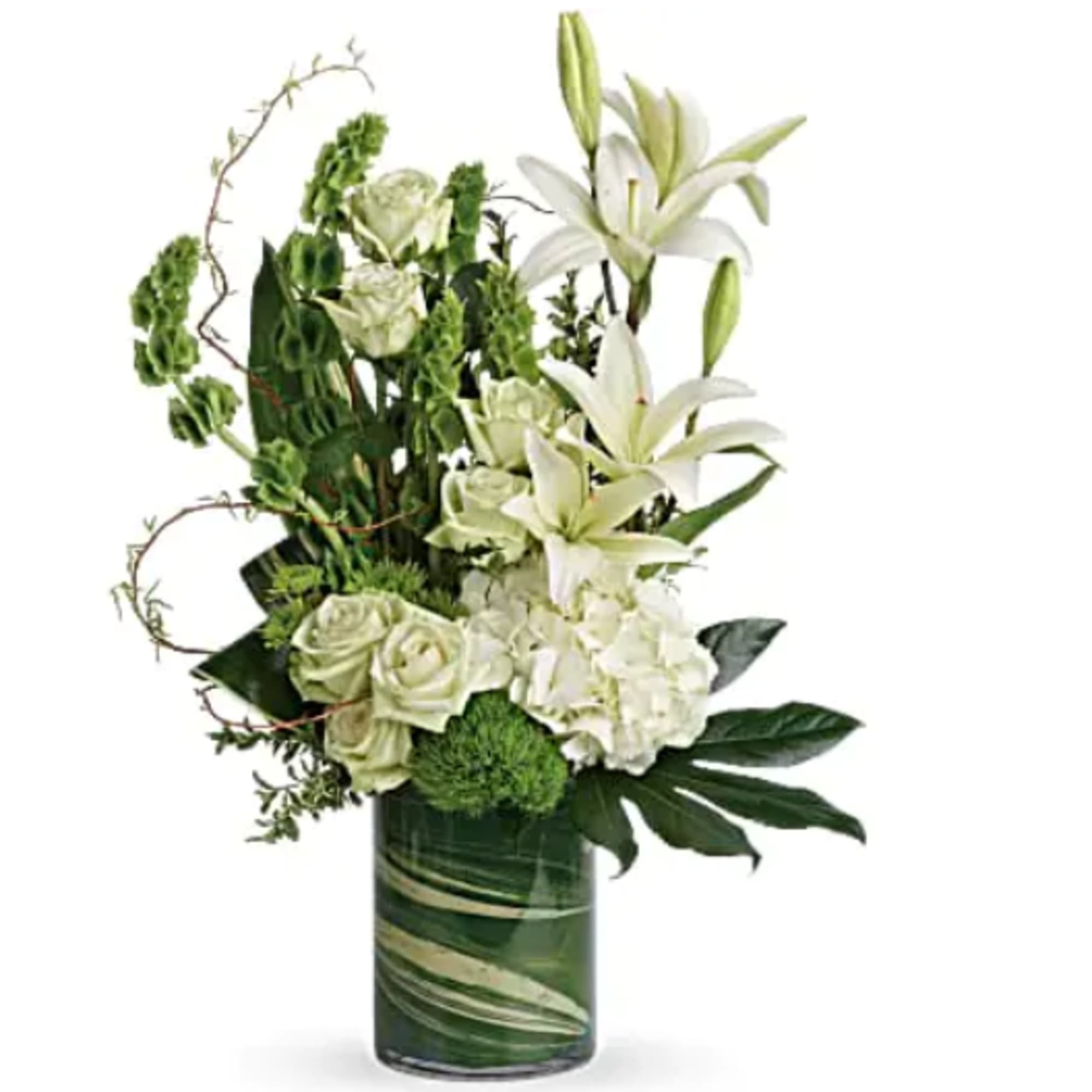 White lilies and pale roses in a green glass vase