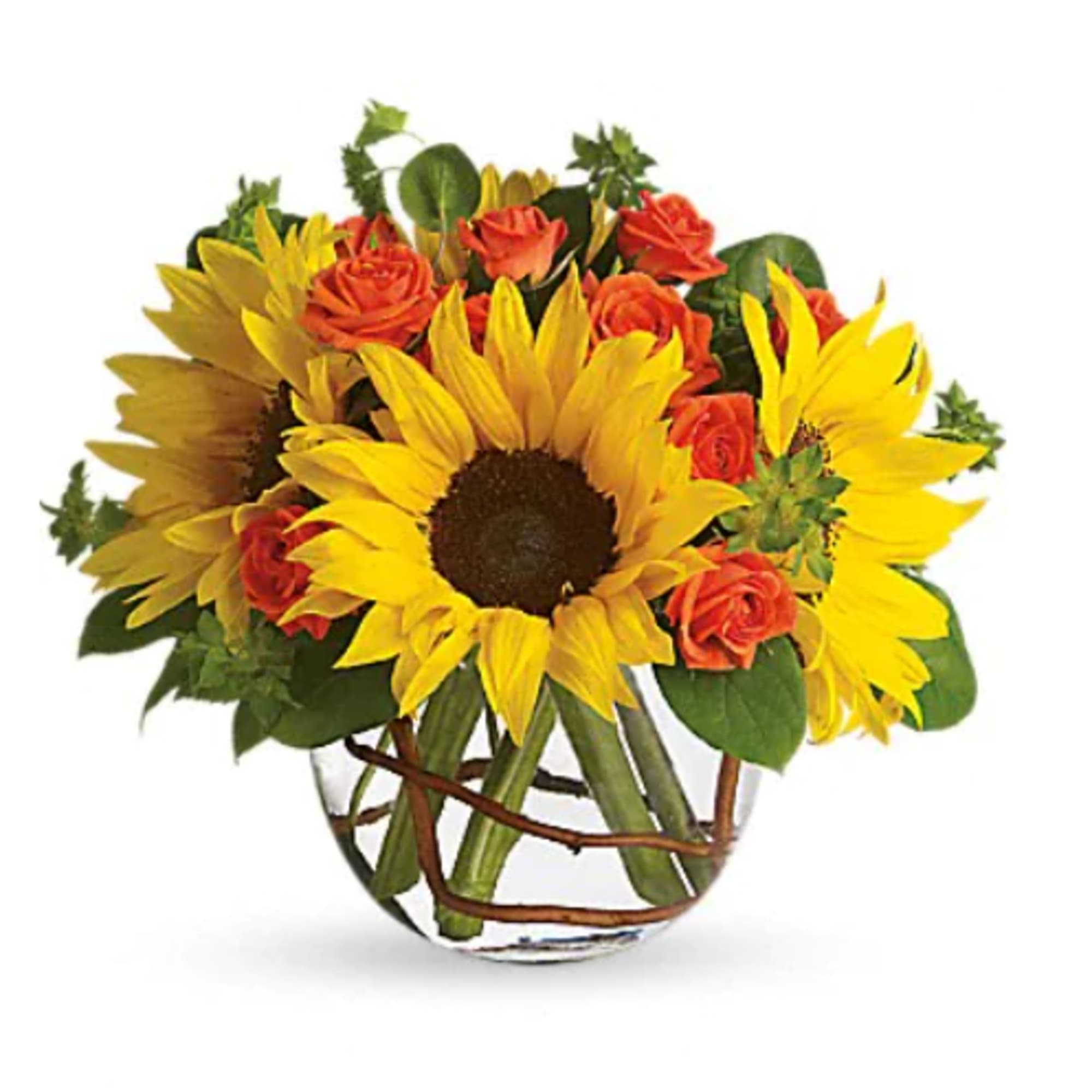 Sunflowers and orange roses in a clear glass vase