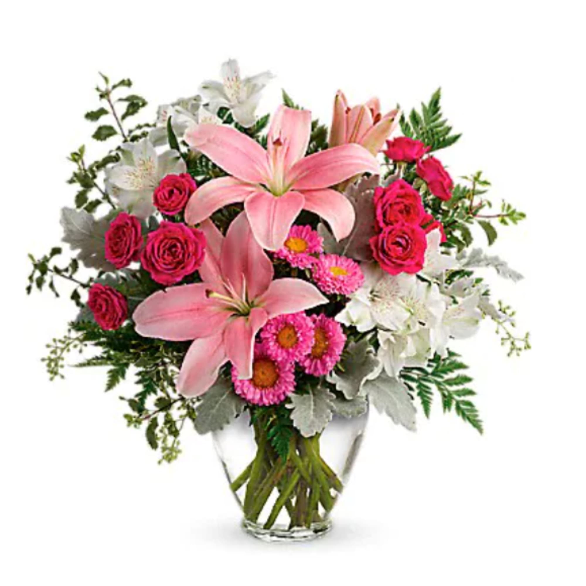 Pink lilies and roses in a clear glass vase