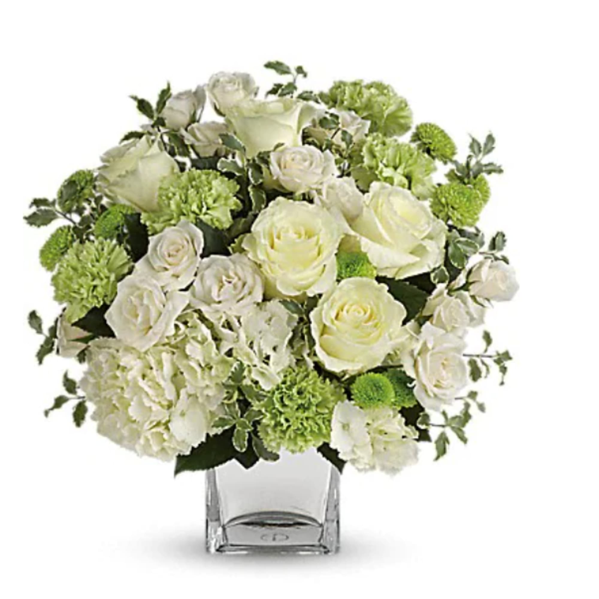 White roses and green carnations in a clear square vase