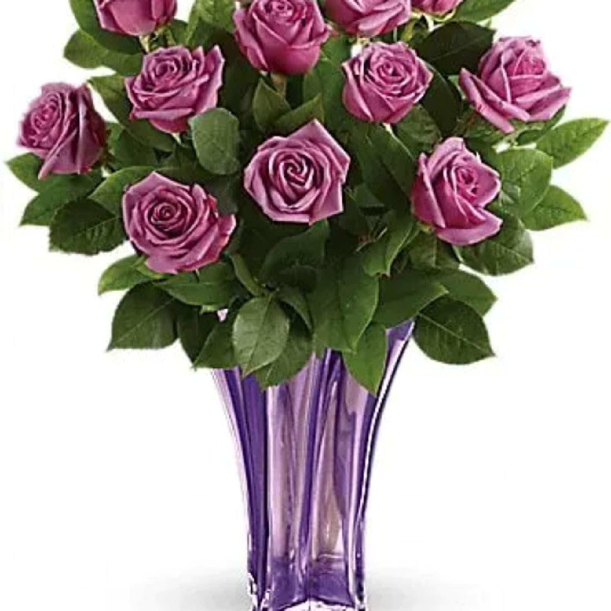 Purple roses in a tall purple glass vase