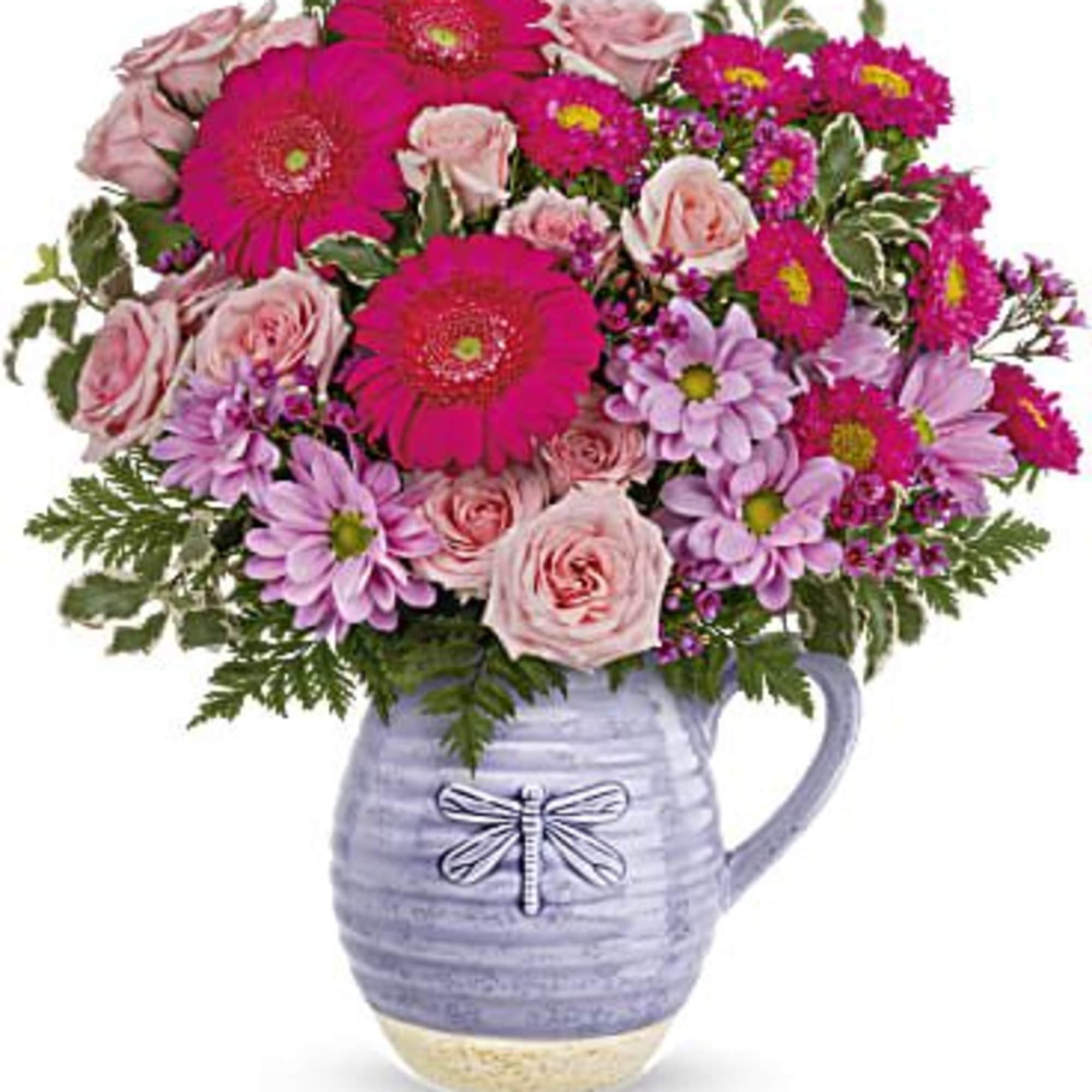 Lovely in lavender! With its beautiful artisanal glaze and whimsical dragonfly, this