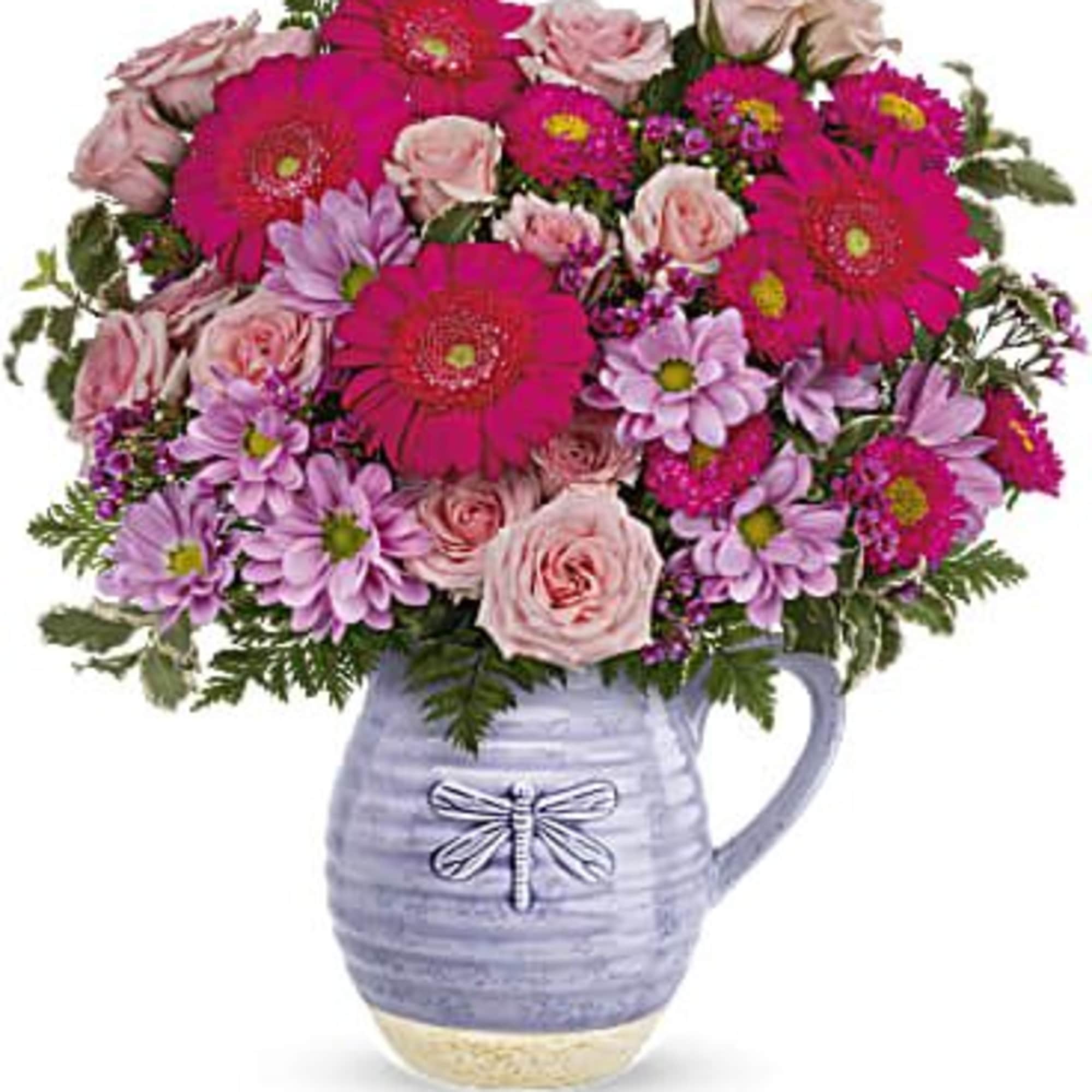 Lovely in lavender! With its beautiful artisanal glaze and whimsical dragonfly, this