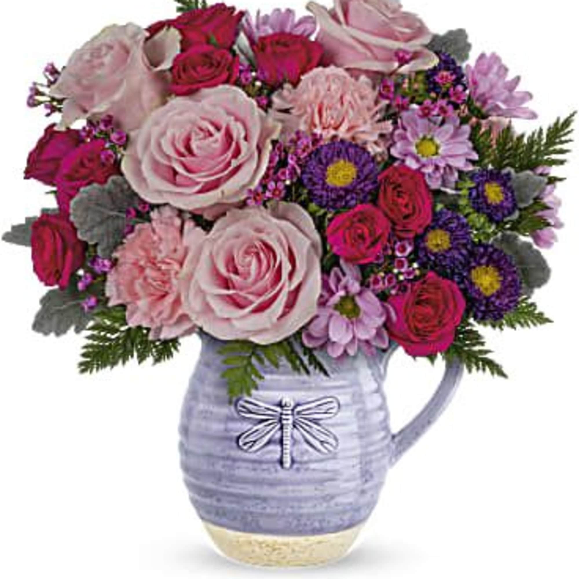 Gorgeous roses and a keepsake pitcher--it's the perfect 2-in-1 gift! Take their