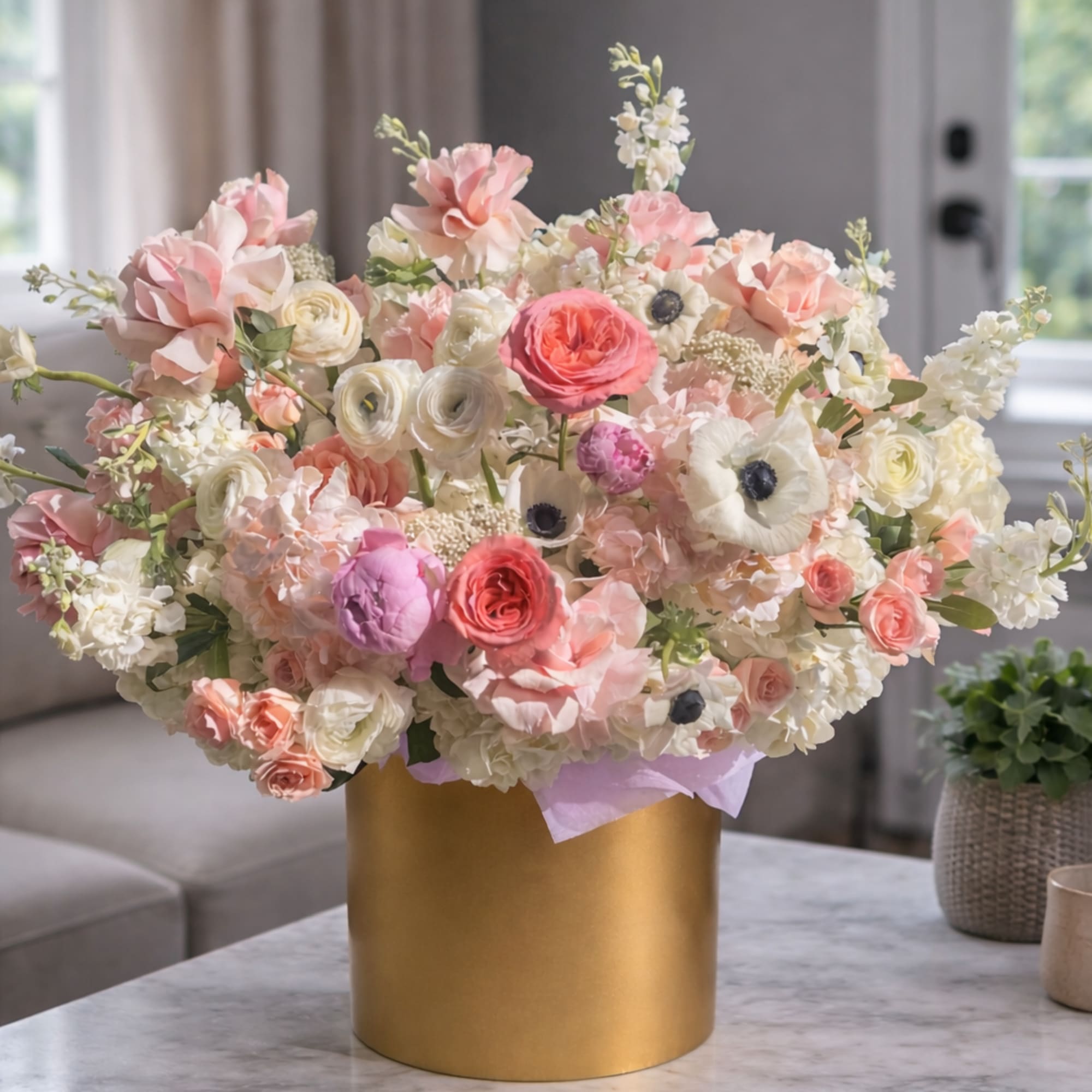 Overflowing with soft pastels, this large flower arrangement-perfect as a birthday bouquet