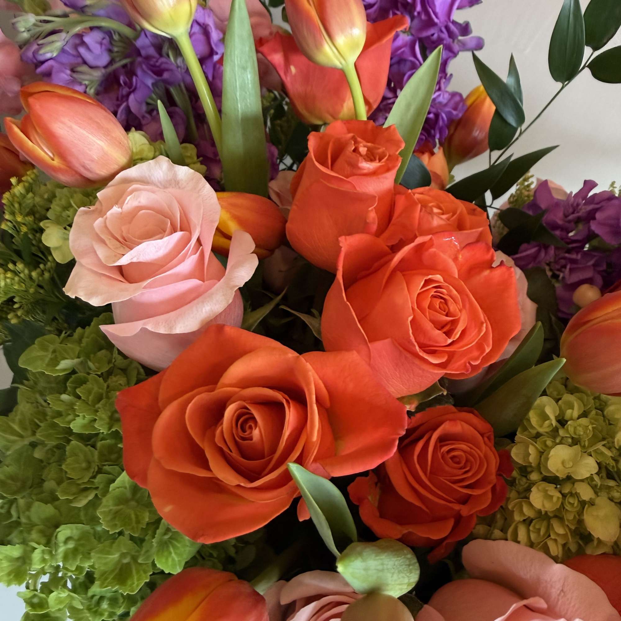 A vibrant blend of orange, soft pinks, and purples,  designed to, photo 2 of 3