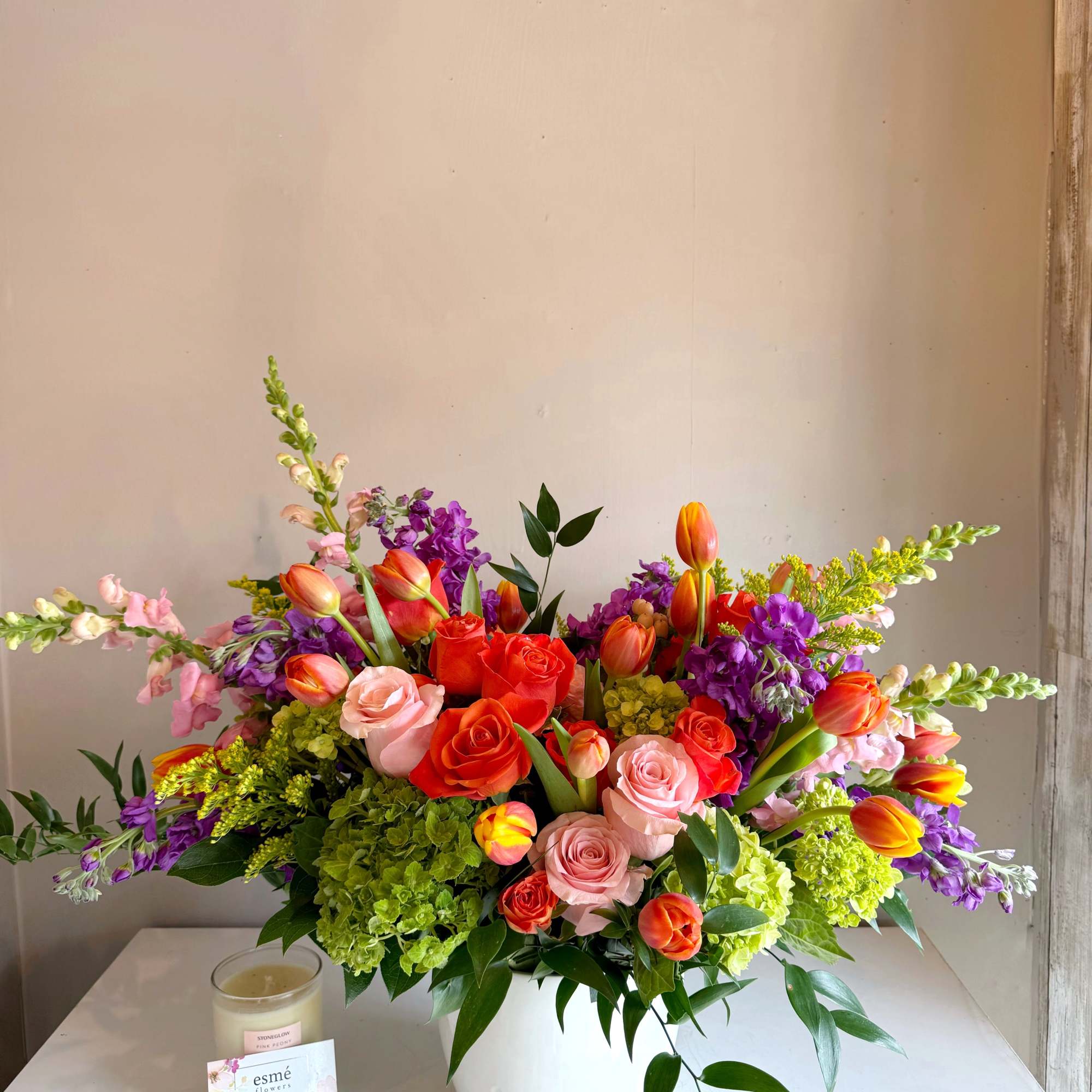 A vibrant blend of orange, soft pinks, and purples,  designed to, photo 3 of 3