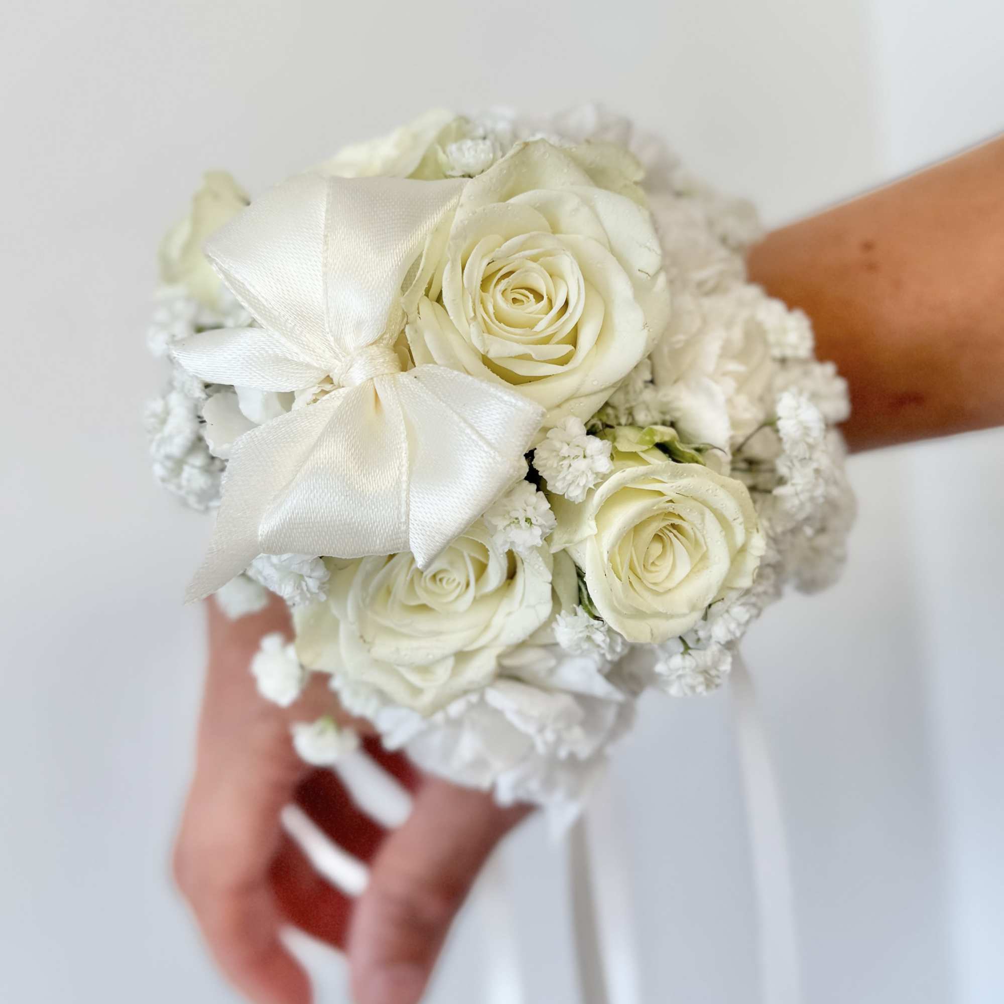 A youthful and elegant design especially created by the Florist. Flowers are