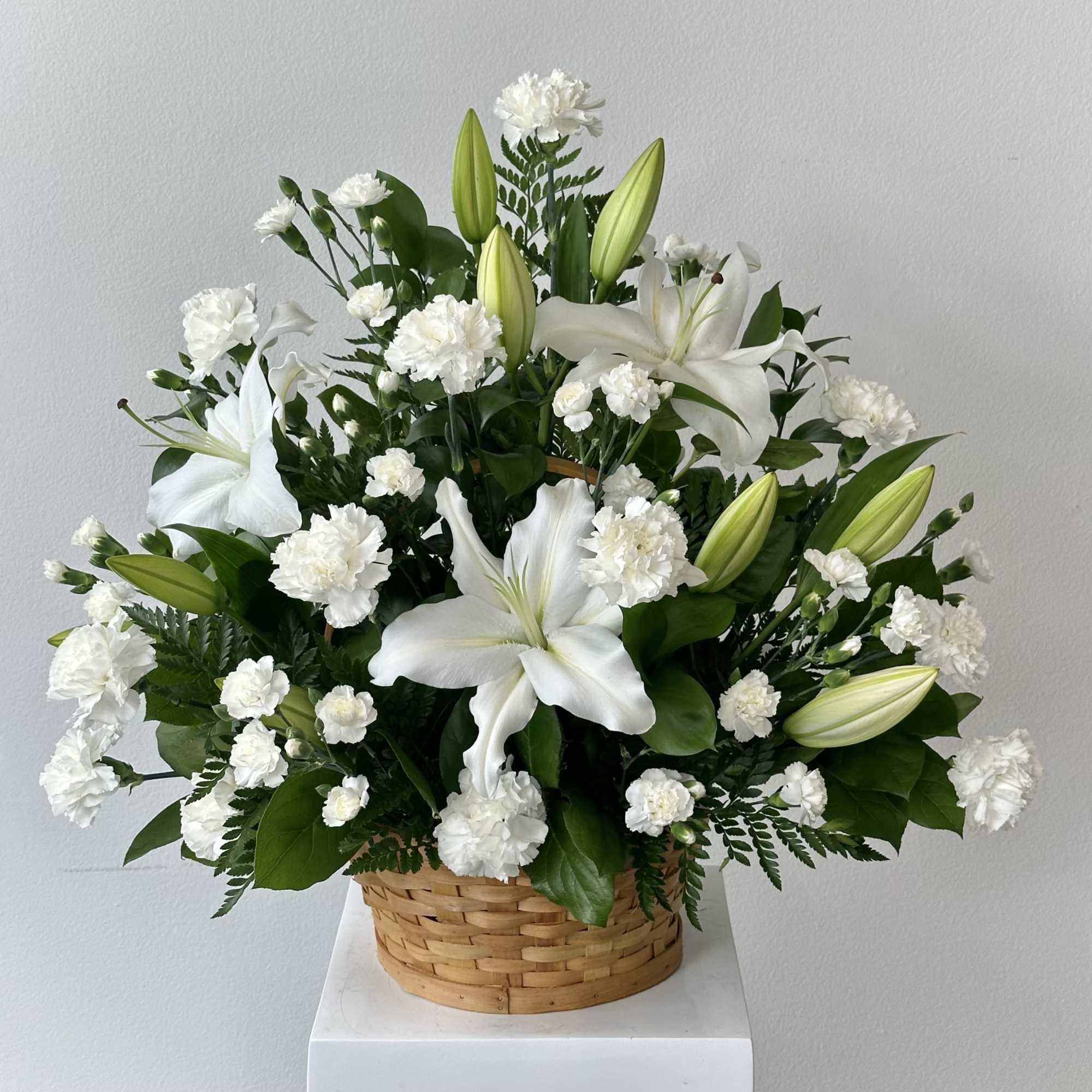 Elevate any moment with the serene elegance of our Peaceful White Lilies