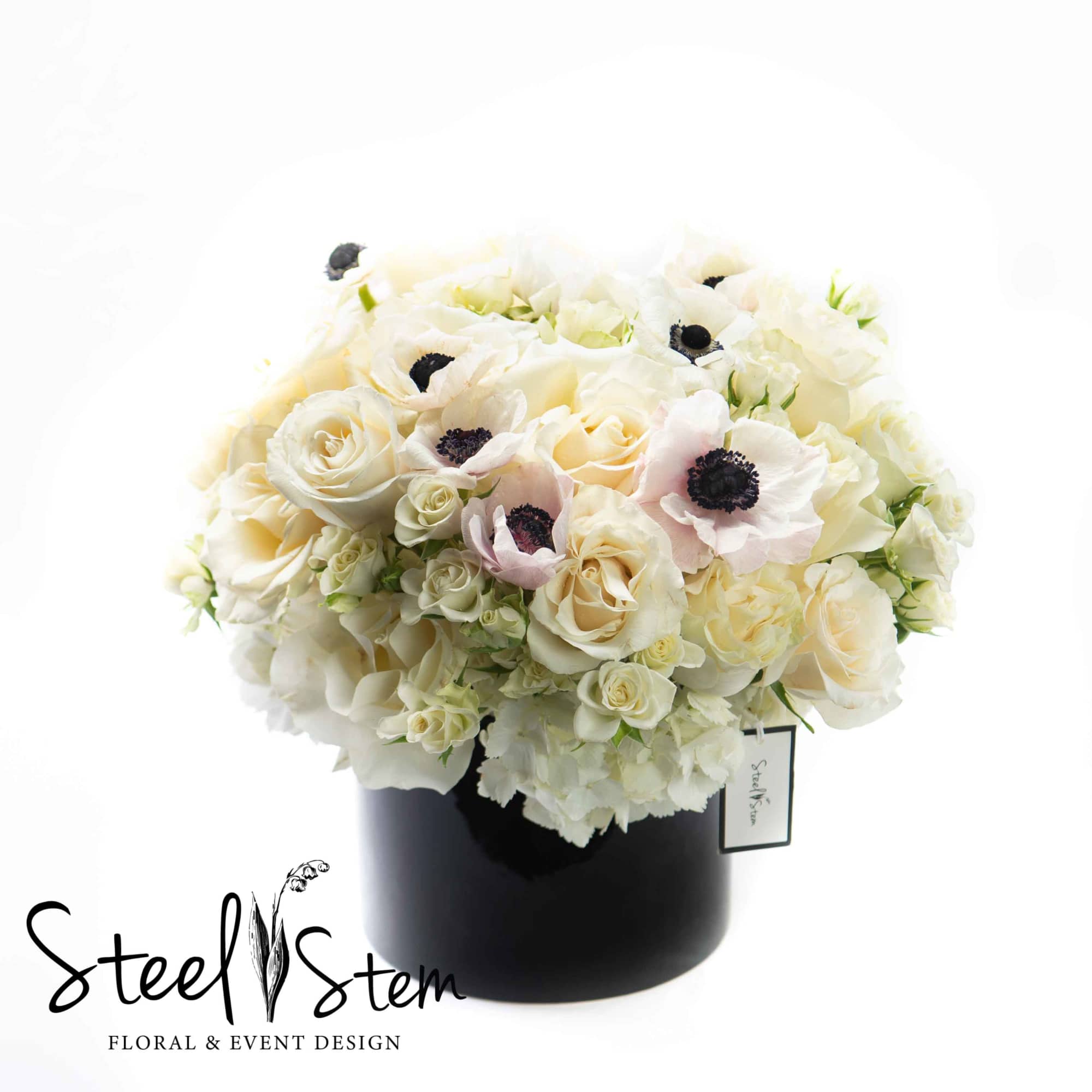 Looking for a chic and elegant arrangement? We've got you covered!

A black