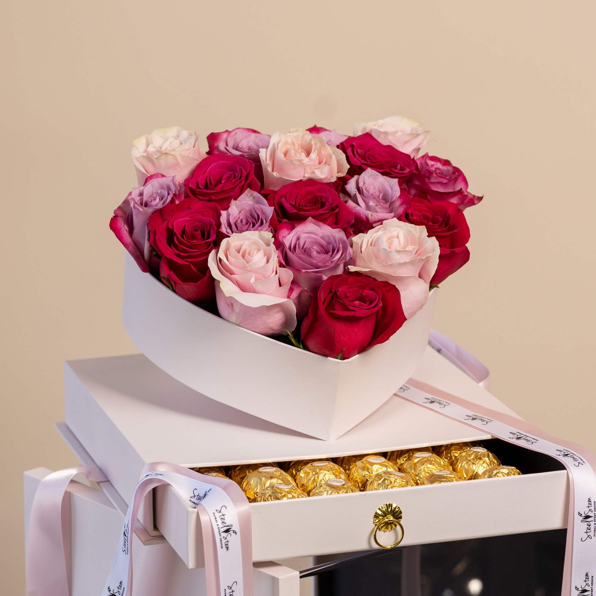This stunning heart-shaped gift box, elegantly designed with an acrylic top, is