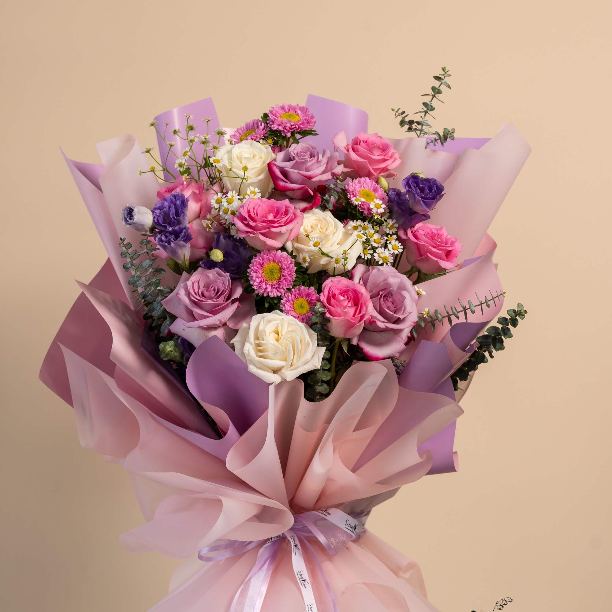 Like the first light of morning, Blossom at Dawn is a bouquet