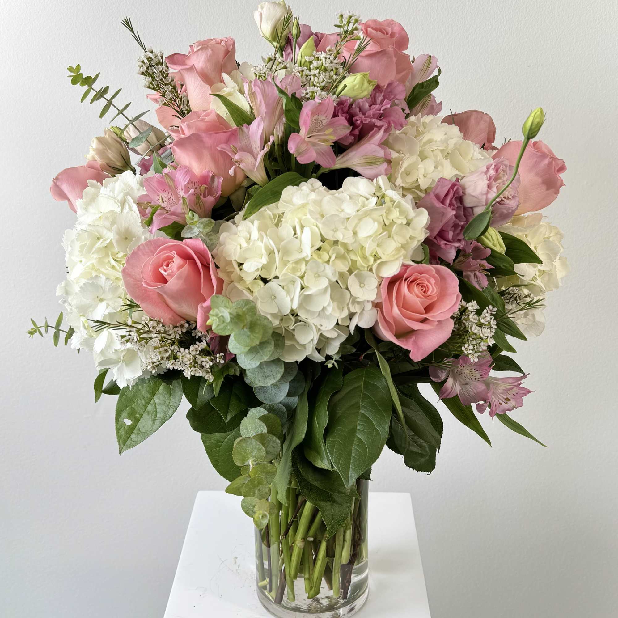 Make Me Blush is a sophisticated bouquet blends timeless elegance with modern