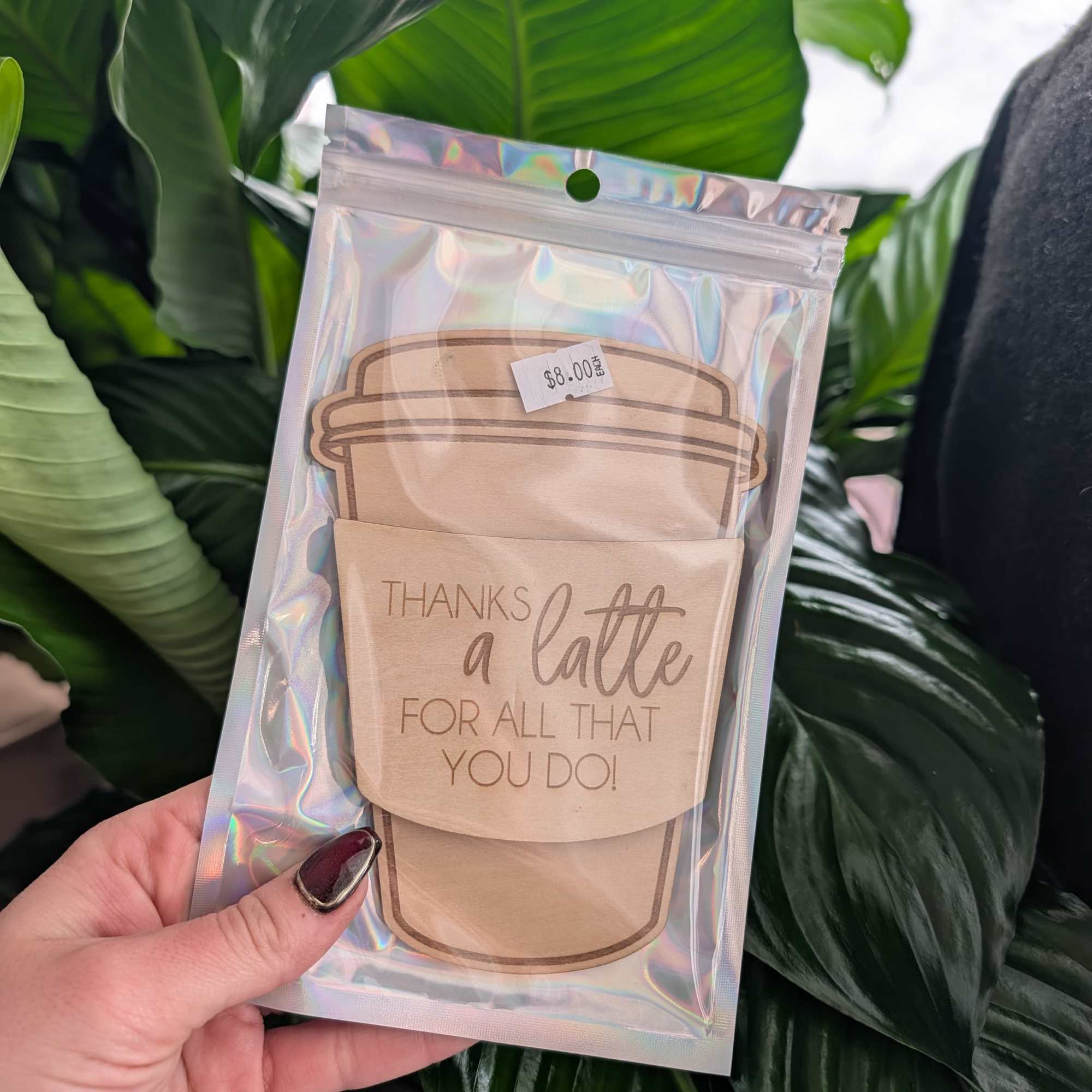 Gift card in a clear pouch with a coffee cup design