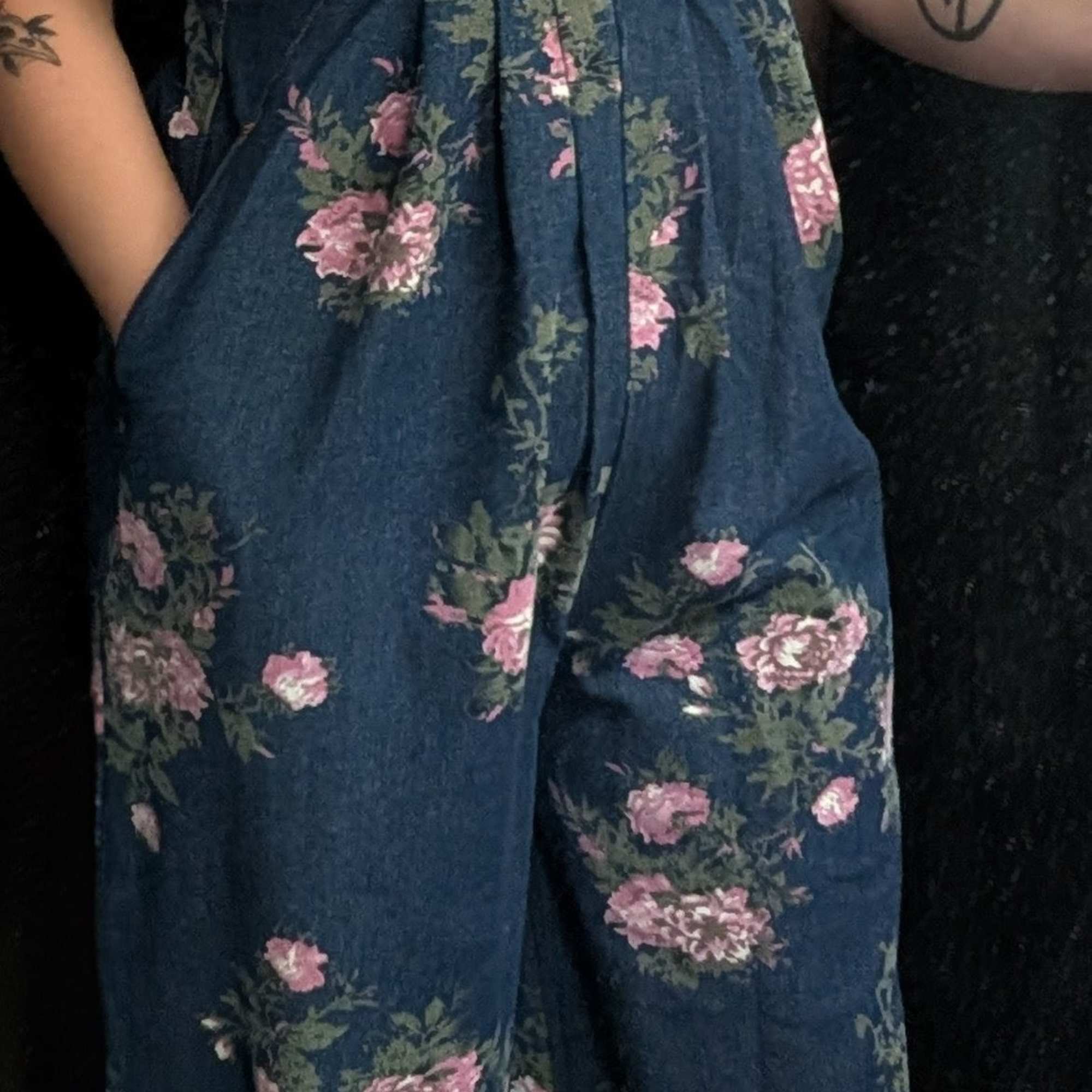 Oversized flare leg denim overalls with a front pouch, a back pocket